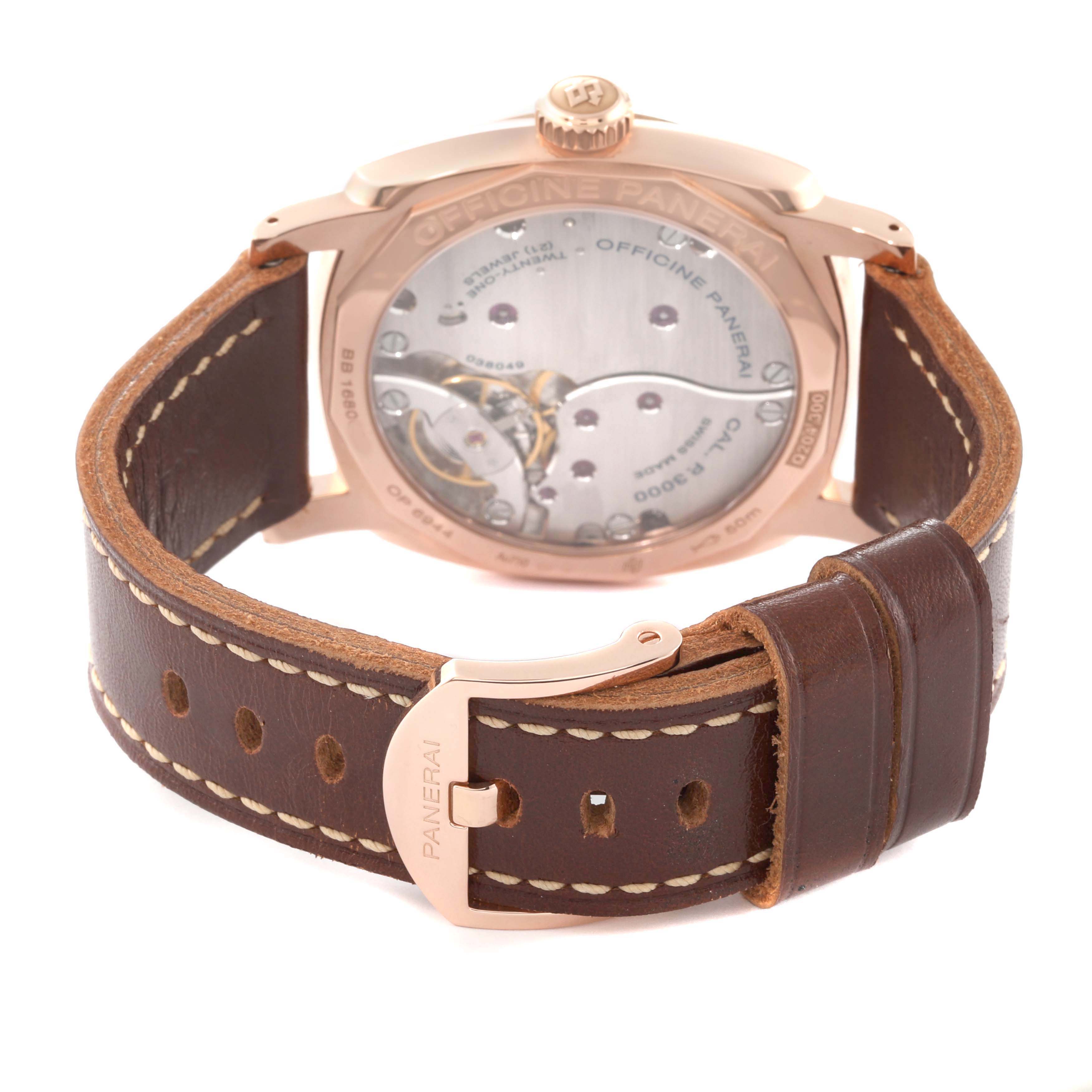The image shows the back view of a Panerai Radiomir PAM00515 Men's Rose Gold Brown Dial watch, highlighting the movement and leather strap.