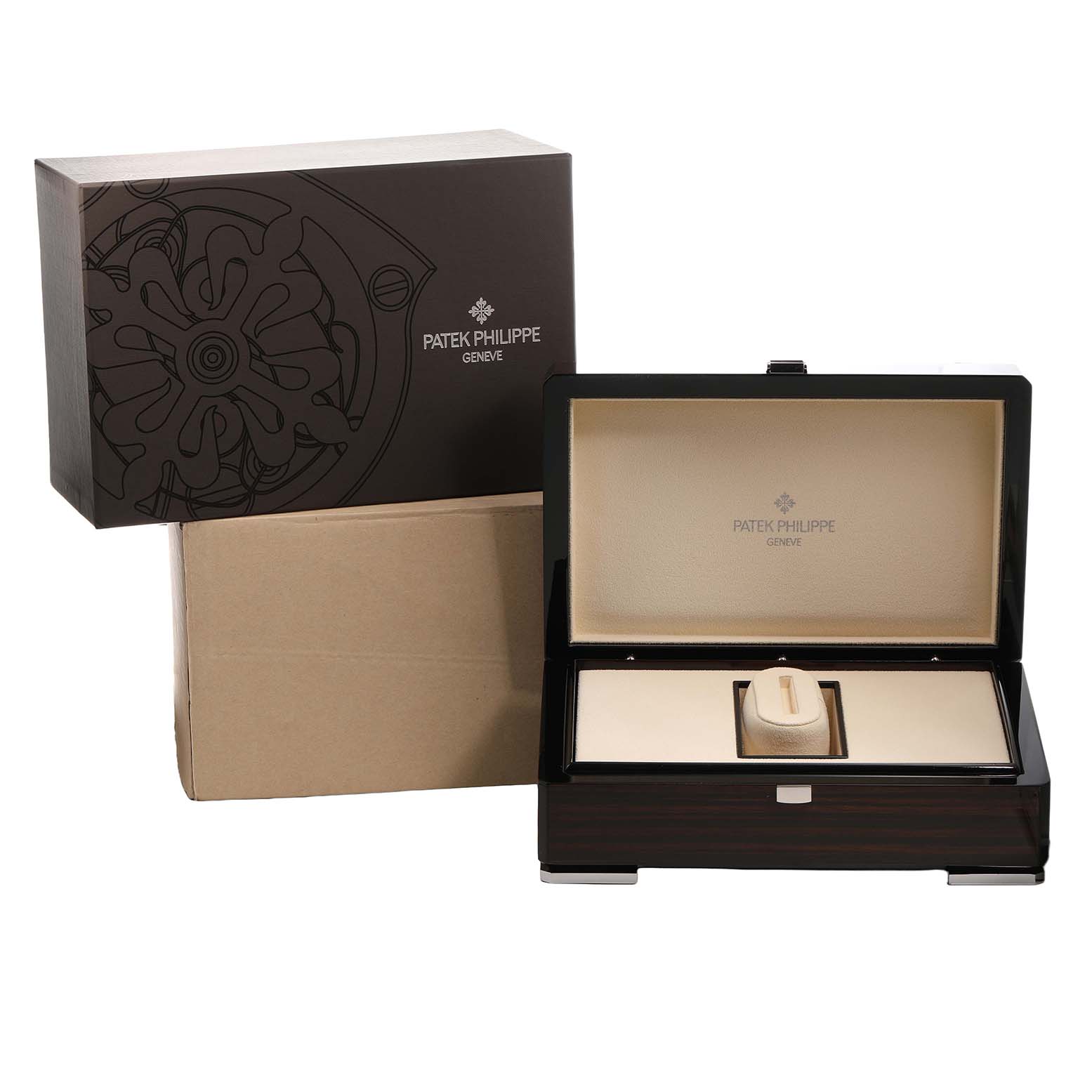The image shows a Patek Philippe Calatrava 6119R-001 Men's Rose Gold Silver Dial presentation box and outer packaging from a front angle.