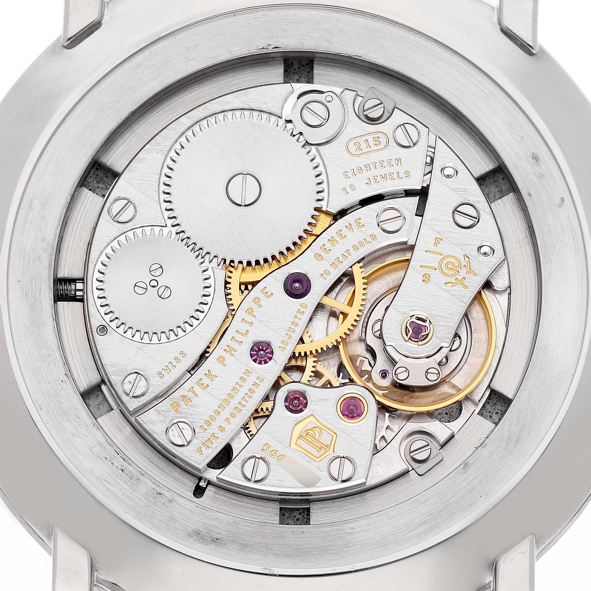 The image shows the back view of a Patek Philippe Calatrava 5116G-001 Men's White Gold White Dial, detailing its intricate mechanical movement.