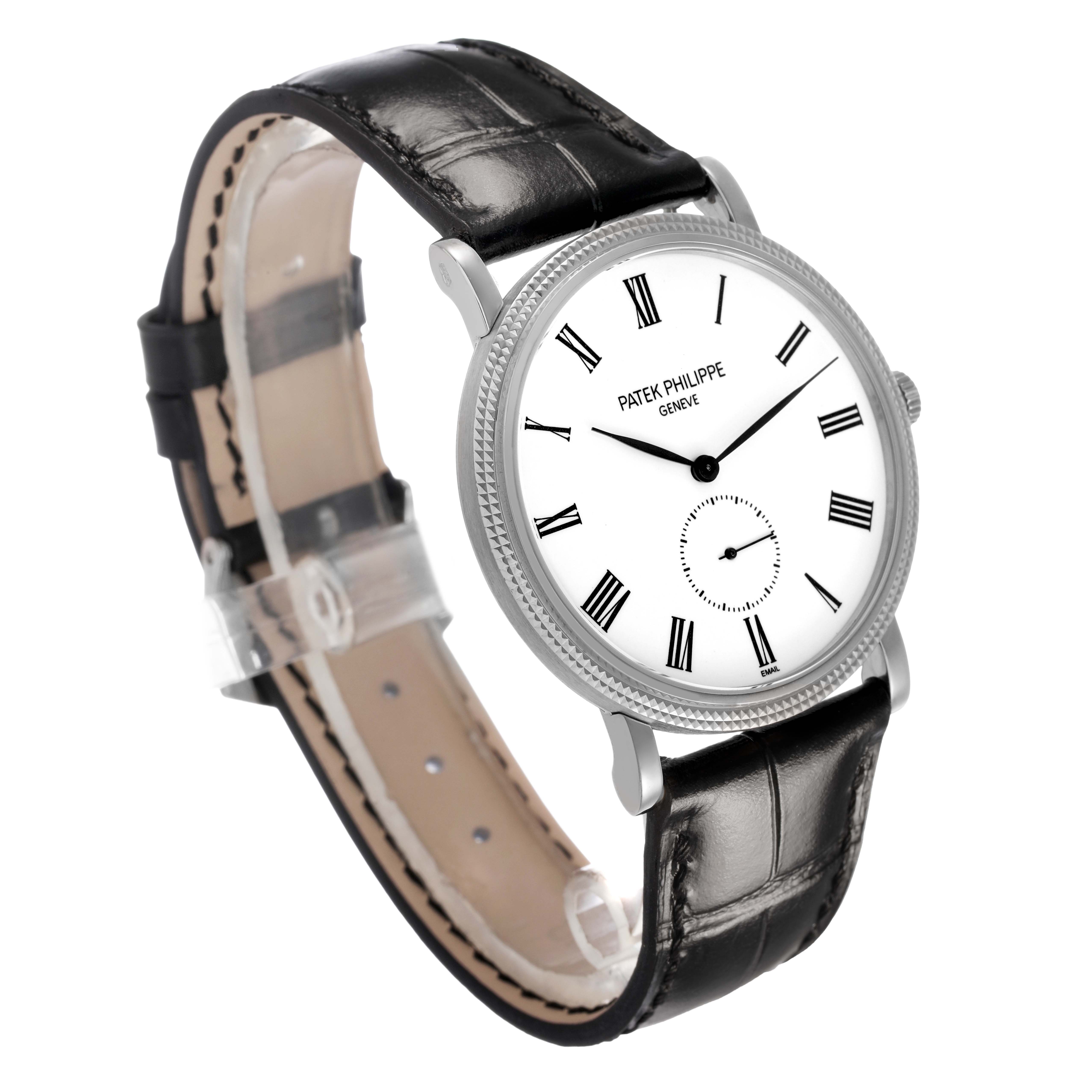 The Patek Philippe Calatrava 5116G-001 Men's White Gold White Dial watch is shown at a 3/4 angle, highlighting the dial, bezel, and leather strap.