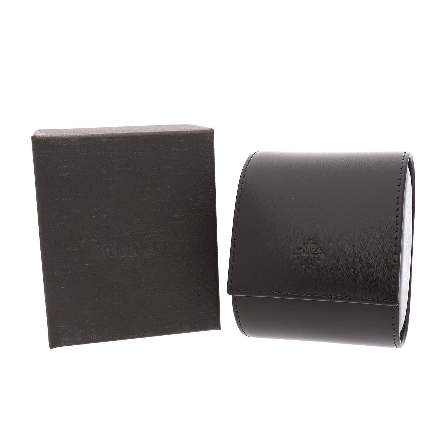 The image shows the box and leather case for the Patek Philippe Calatrava 5116G-001 Men's White Gold White Dial watch.