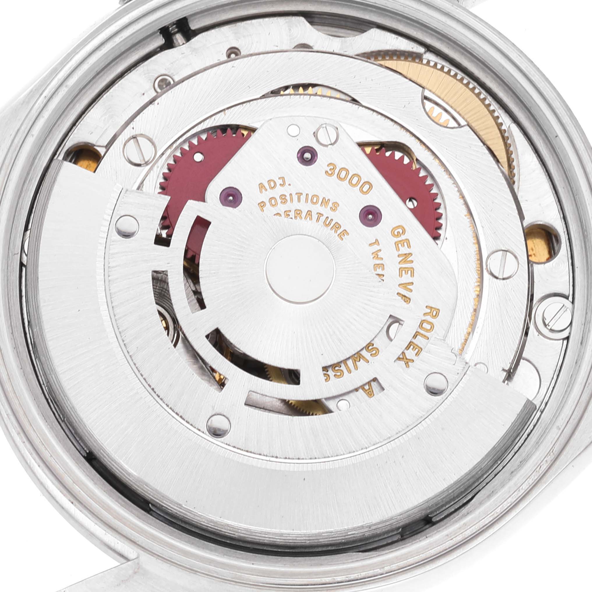 This image shows a close-up of the movement mechanism of the Rolex Air-King 14000 Men's Stainless Steel Blue Dial 14000 Men's Stainless Steel Blue Dial watch, highlighting the intricate inner components.