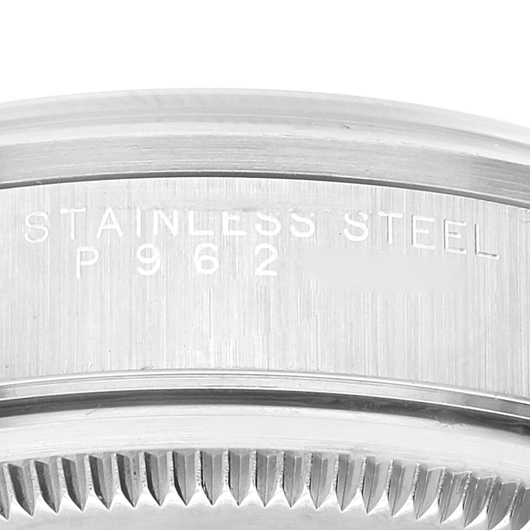 This close-up image shows the engraved stainless steel casing of a Rolex Air-King 14000 Men's Stainless Steel Silver Dial 14000 Men's Stainless Steel Silver Dial watch.
