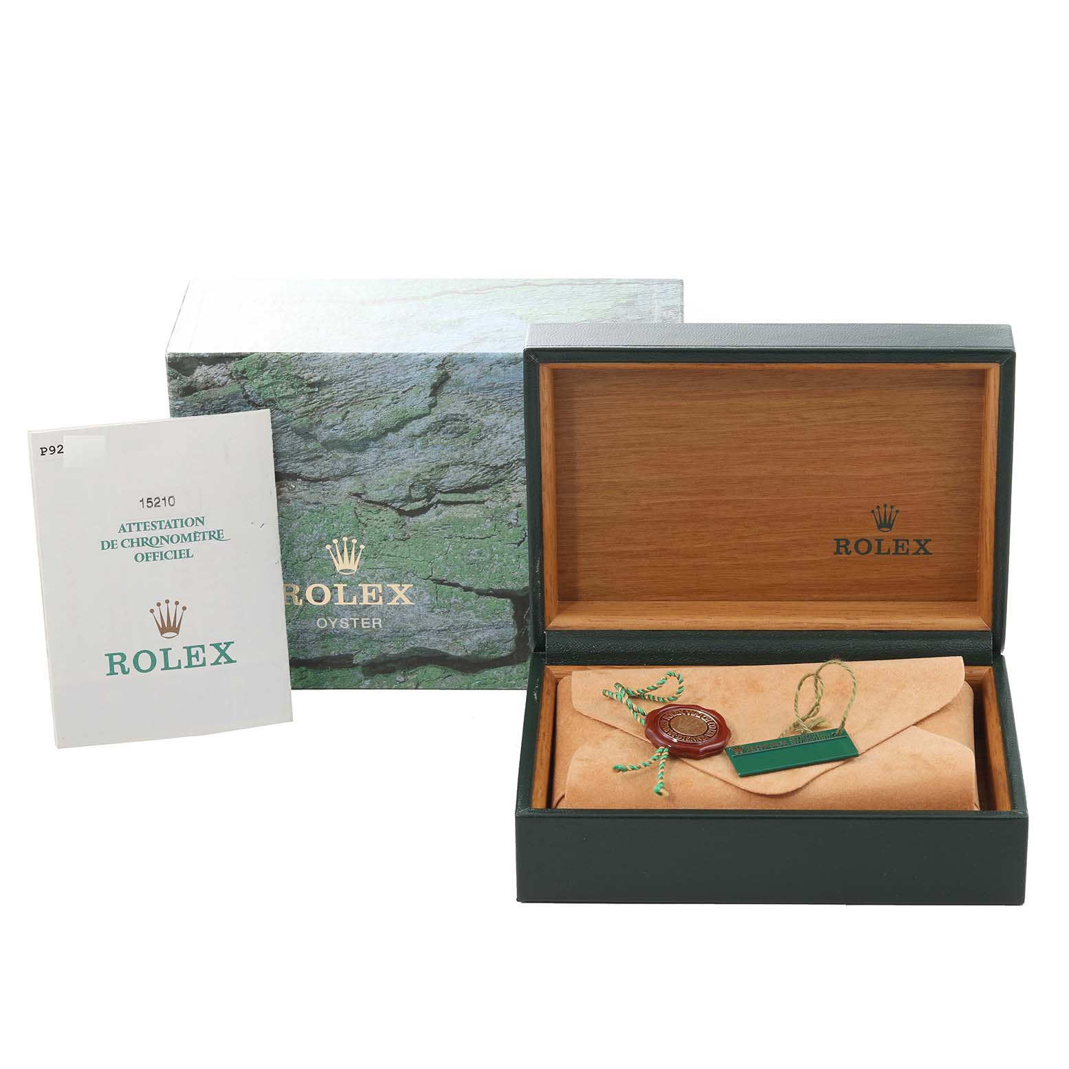 The image shows the packaging, certificate, and case for a Rolex Date 15210 Men's Stainless Steel Black Dial 15210 Men's Stainless Steel Black Dial model, viewed from the front angle.