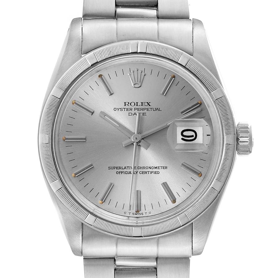 This is a close-up of the Rolex Date model, showing the face, bezel, crown, and part of the bracelet.