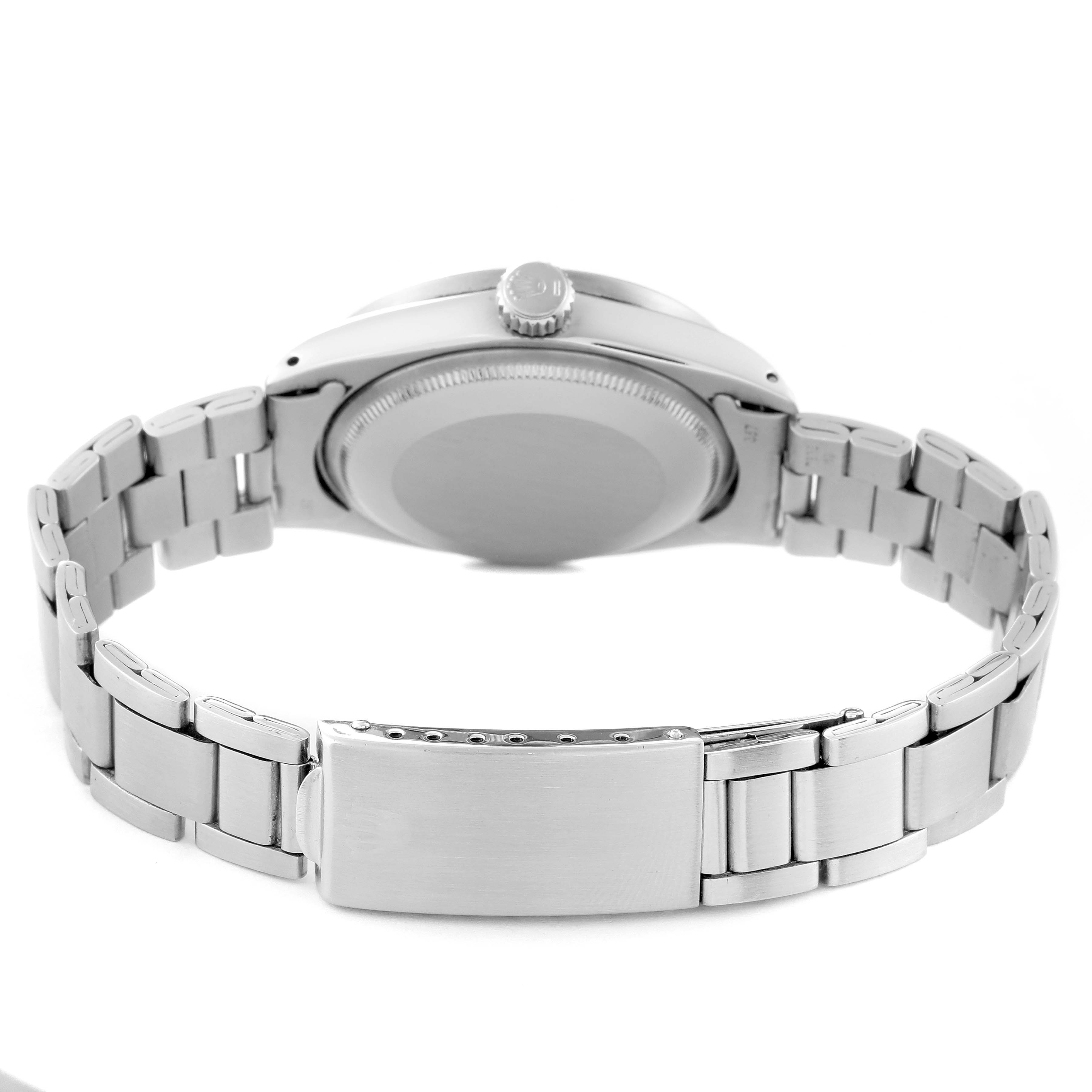 The image shows the back view of the case and bracelet of a Rolex Date 1501 Men
s Stainless Steel Silver Dial 1501 Men
s Stainless Steel Silver Dial model watch.