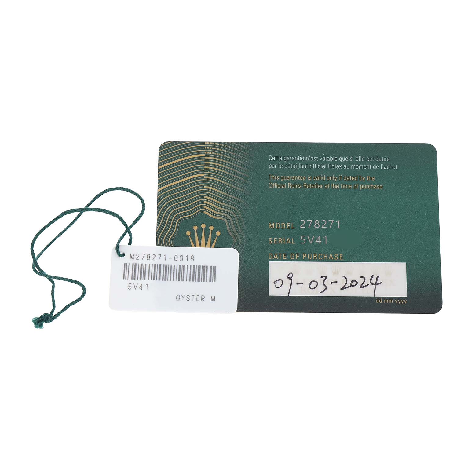 The image shows a Rolex guarantee card for the Mid-Size model 278271 and a tag with a serial number.