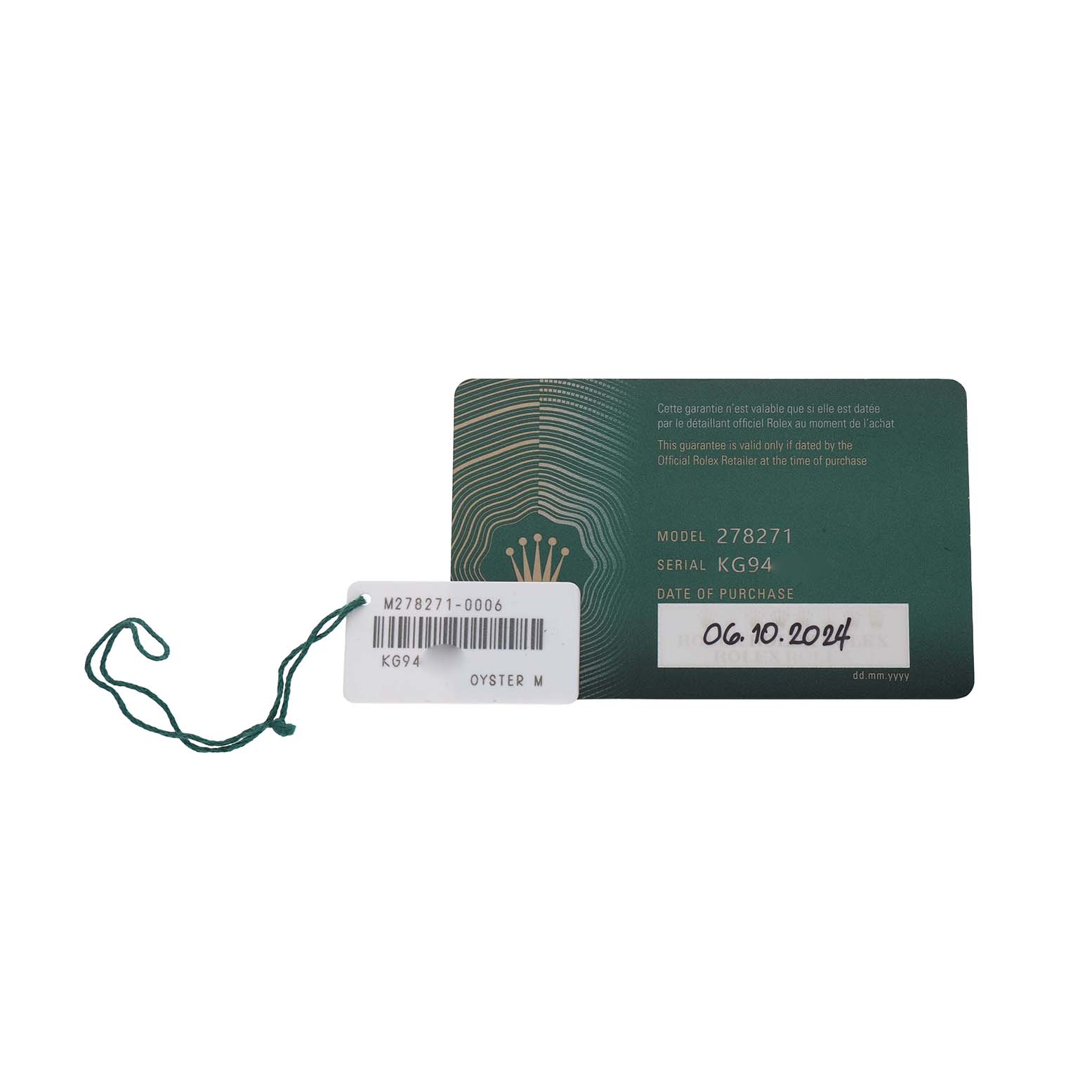 The image shows a Rolex Mid-Size 278271 Women's Steel and Gold (two tone) Pink Dial model 278271 warranty card and a tag with a green string.