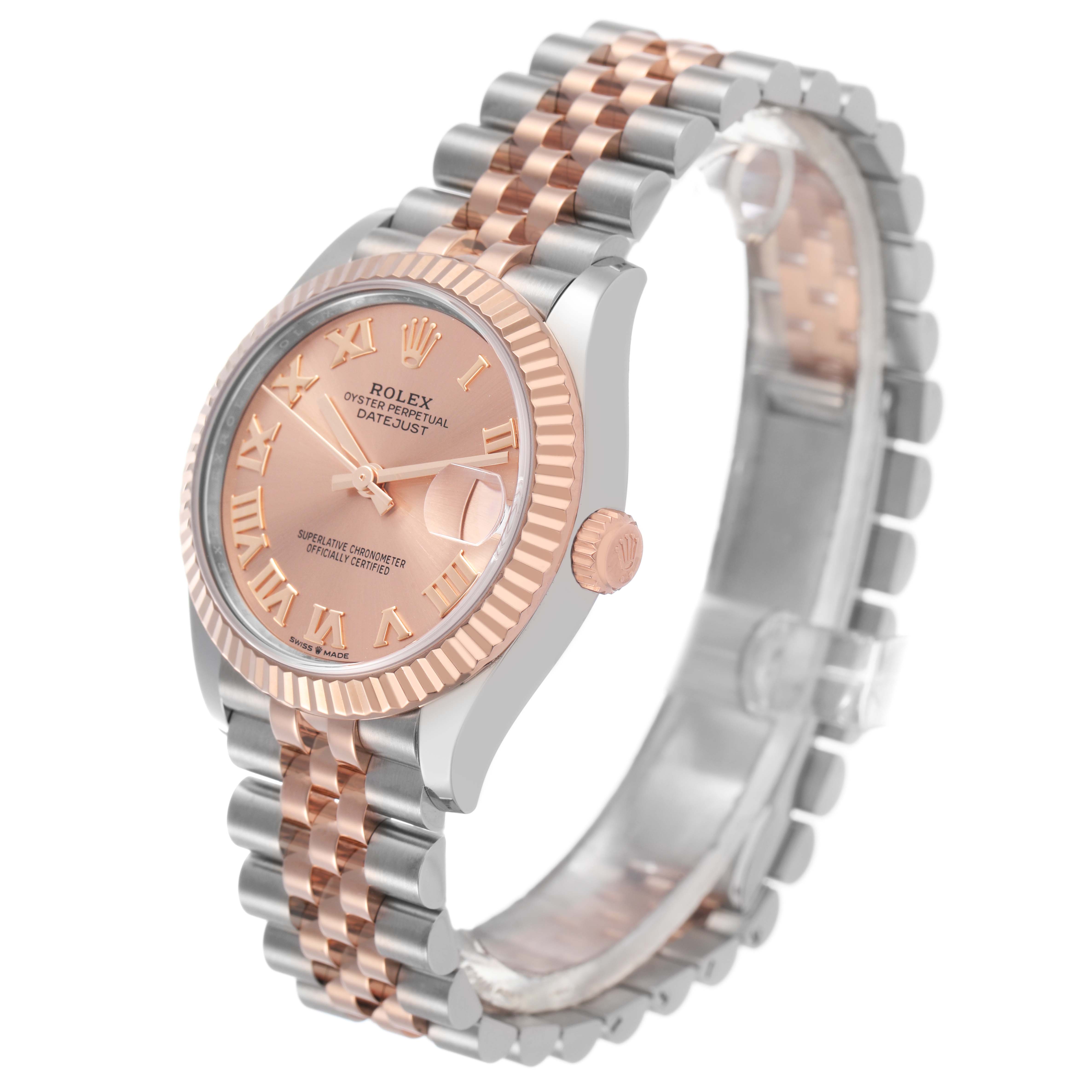 The Rolex Mid-Size 278271 Women's Steel and Gold (two tone) Pink Dial watch is shown at a slight angle, highlighting the face, fluted bezel, and two-tone bracelet.
