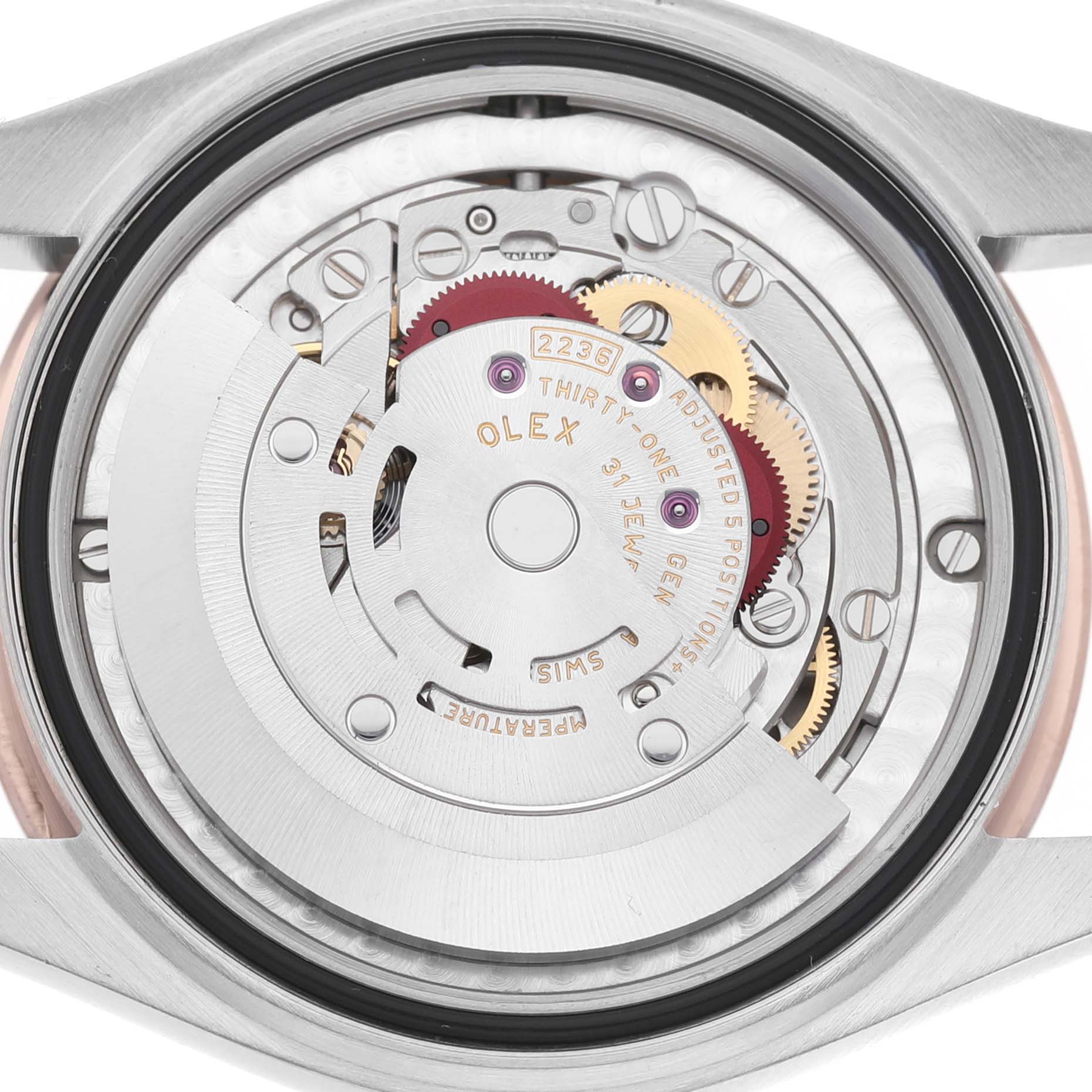 This image shows the movement mechanism from the back of a Rolex Mid-Size 278271 Women's Steel and Gold (two tone) Pink Dial watch.
