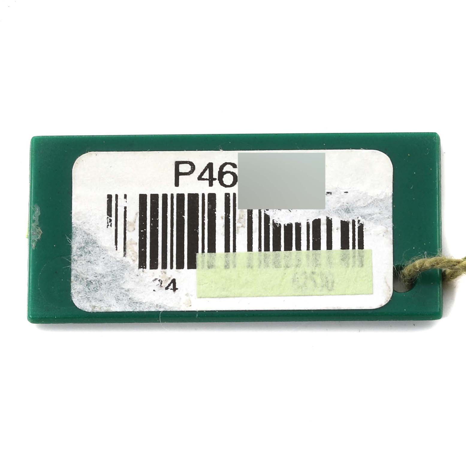 This is a green rectangular tag with a barcode and partially obscured numbers, likely an accessory for a Rolex Datejust 16234 Men's Stainless Steel Silver Dial 16234 Men's Stainless Steel Silver Dial watch.
