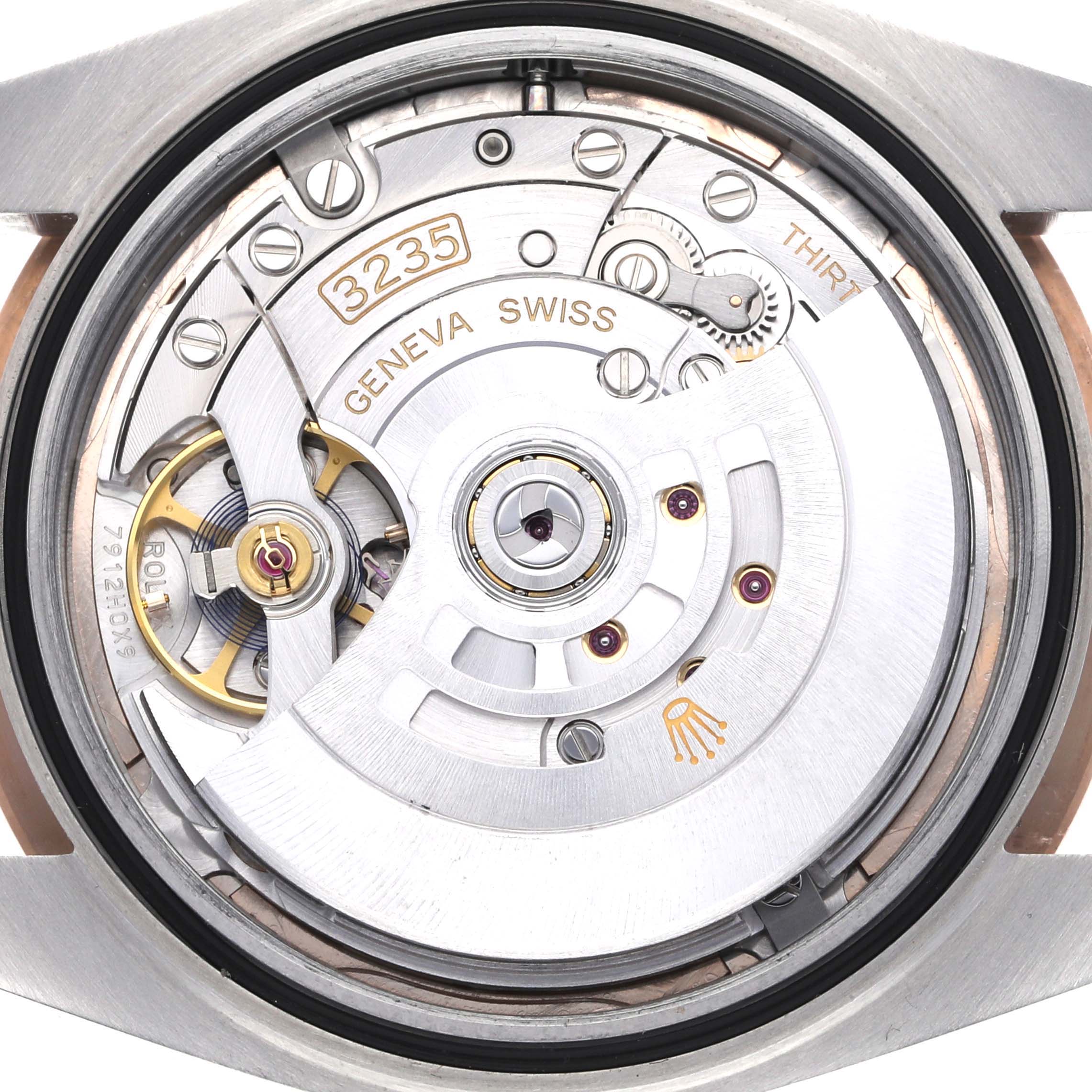 This image shows the movement and inner workings of the Rolex Datejust 41 126331 Men's Steel and Gold (two tone) Pink Dial 126331 Men's Steel and Gold (two tone) Pink Dial model.