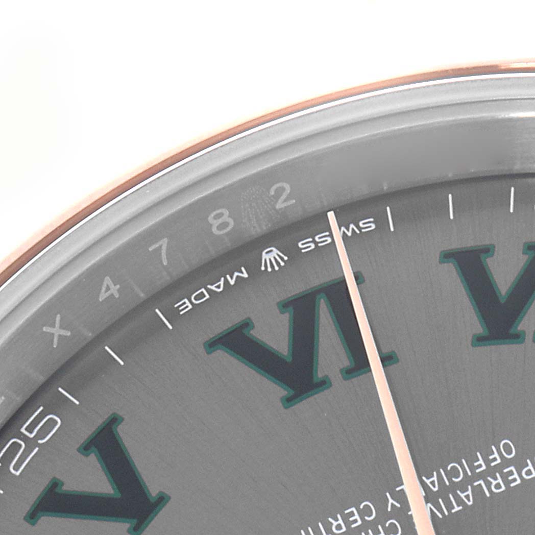 The image shows a close-up of the dial
s upper part of the Rolex Datejust 41, model 126301, with Roman numerals and the "Swiss Made" text visible.