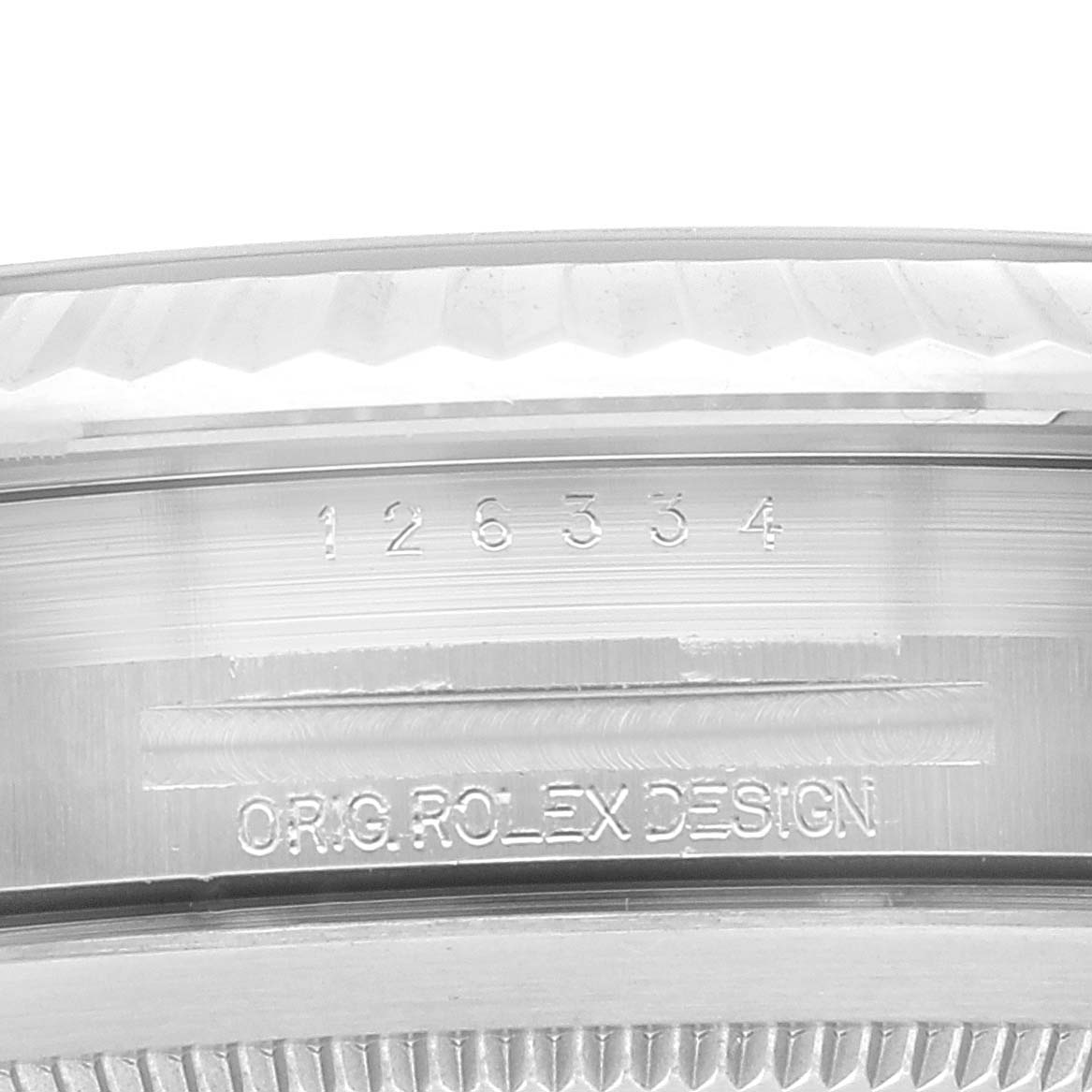 This close-up shows the side of a Rolex Datejust 41 126334 Men's Stainless Steel Blue Dial 126334 Men's Stainless Steel Blue Dial, including the engraved model number and "ORG. ROLEX DESIGN".