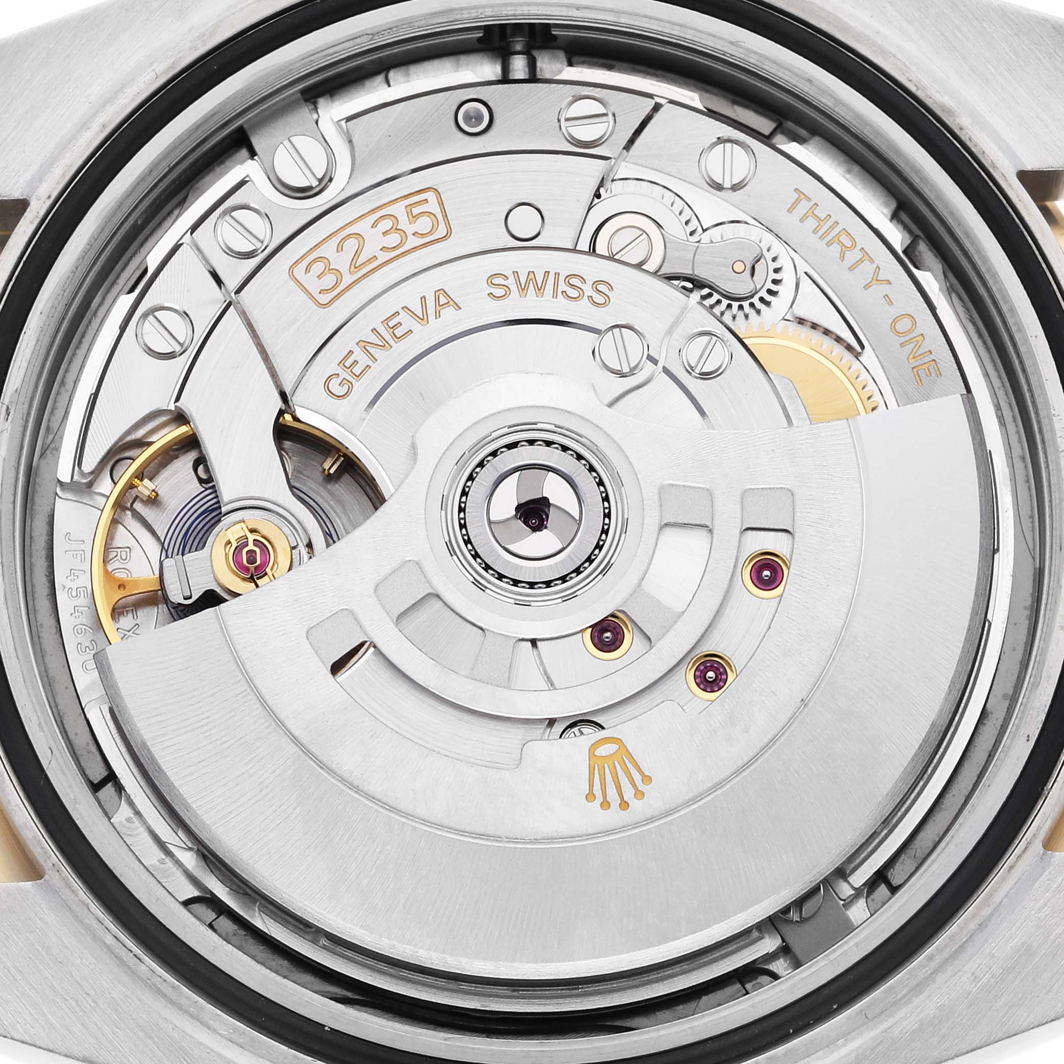 This close-up image shows the intricate movement mechanism of the Rolex Datejust 41 126333 Men's Steel and Gold (two tone) Grey Dial 126333 Men's Steel and Gold (two tone) Grey Dial watch, showcasing its detailed internals.