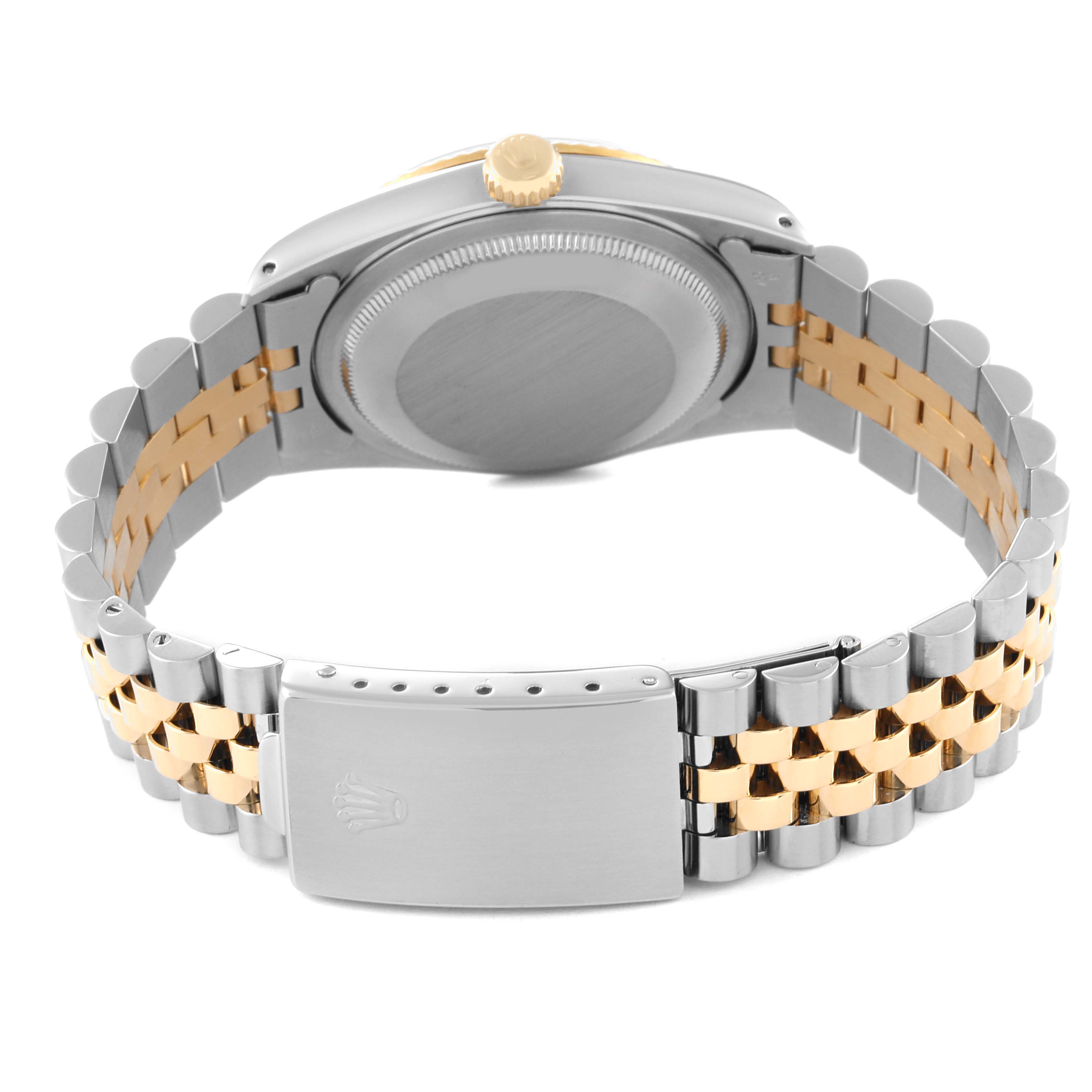 The image shows the back view of a Rolex Datejust 16233 Men's Steel and Gold (two tone) Champagne Dial 16233 Men's Steel and Gold (two tone) Champagne Dial watch, highlighting its case back and two-tone bracelet.