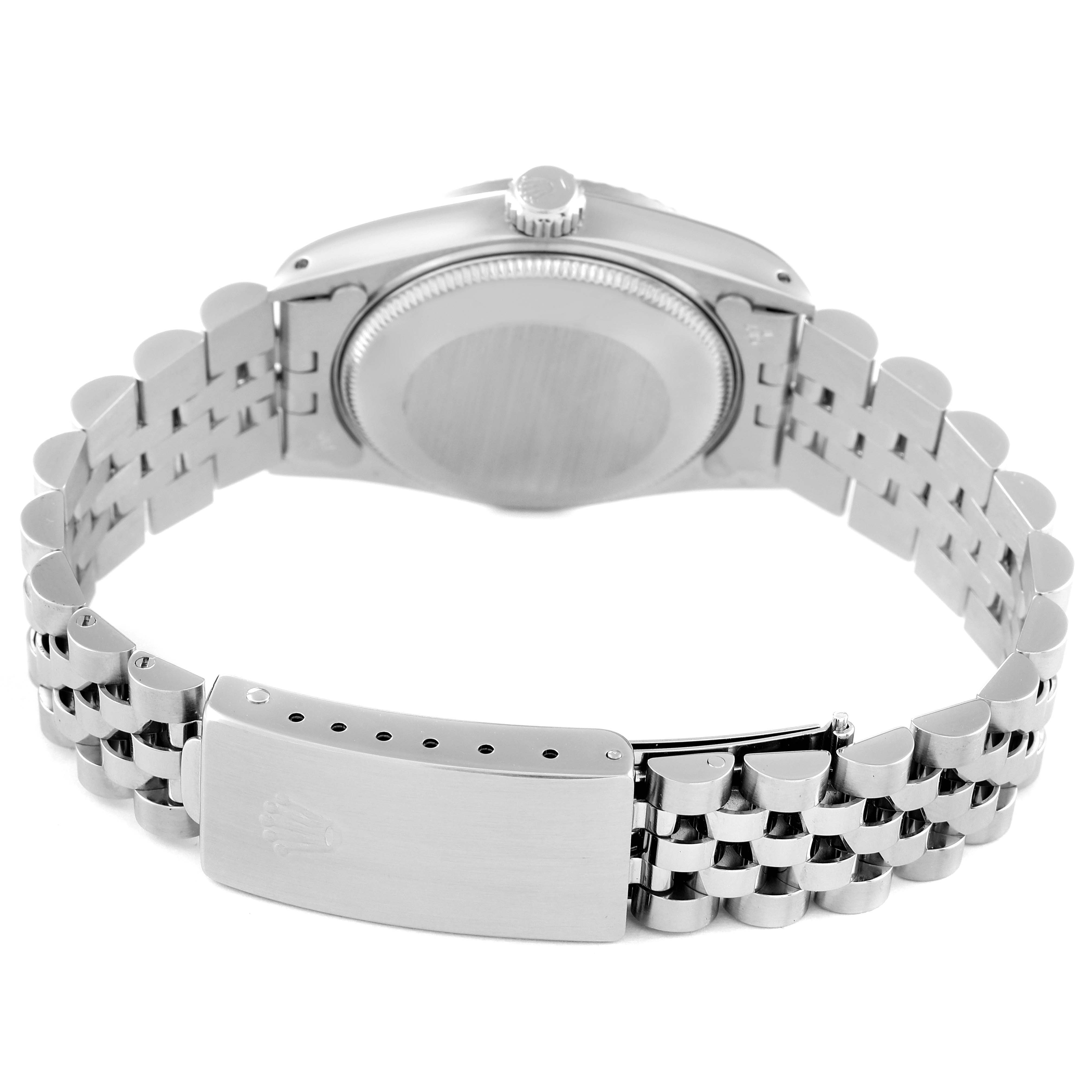 The image shows the back view of a Rolex Mid-Size 68274 Women
s Stainless Steel Blue Dial 68274 Women
s Stainless Steel Blue Dial model watch, highlighting the case back, bracelet, and clasp.