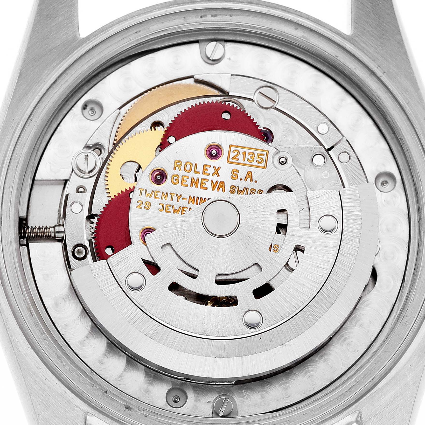 The image shows the back side of a Rolex Mid-Size 68273 Women's Steel and Gold (two tone) Champagne Dial model, highlighting the movement and internal mechanism.