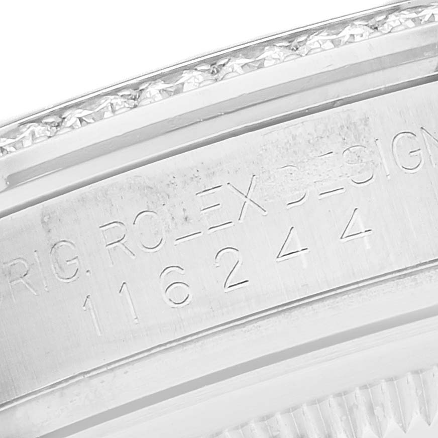 This close-up image shows the side of the casing with engravings of the Rolex Datejust 116244 Men's Stainless Steel Silver Dial 116244 Men's Stainless Steel Silver Dial model.
