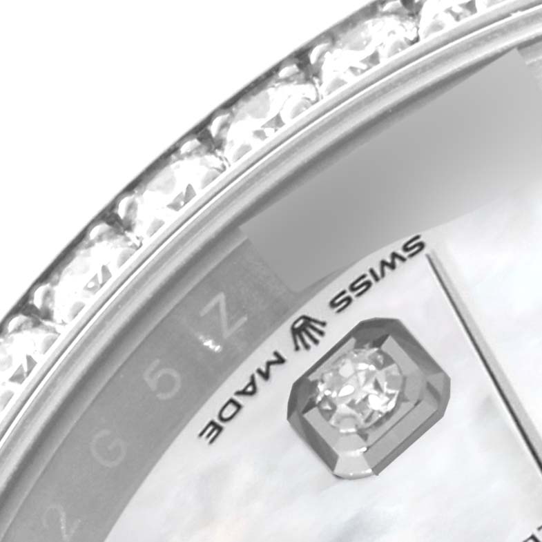 The image shows a close-up of the dial and bezel of a Rolex Datejust 126284RBR Men's Stainless Steel Mother of Pearl Dial 126284RBR Men's Stainless Steel Mother of Pearl Dial, highlighting the diamond hour marker and the "Swiss Made" label.