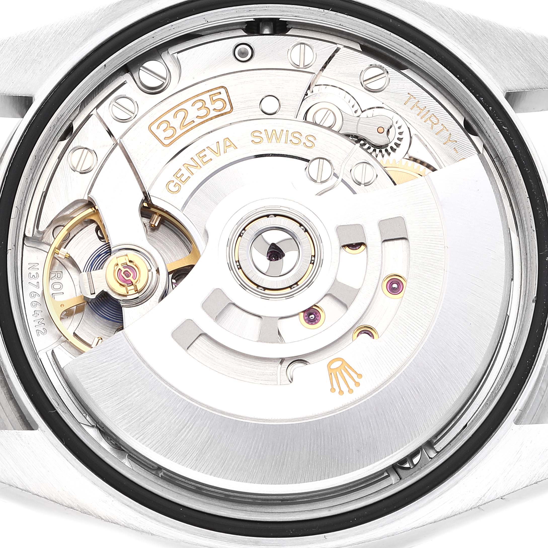 The image shows the movement and inner mechanism of a Rolex Datejust 126284 Men's Stainless Steel Silver Dial 126284 Men's Stainless Steel Silver Dial watch.