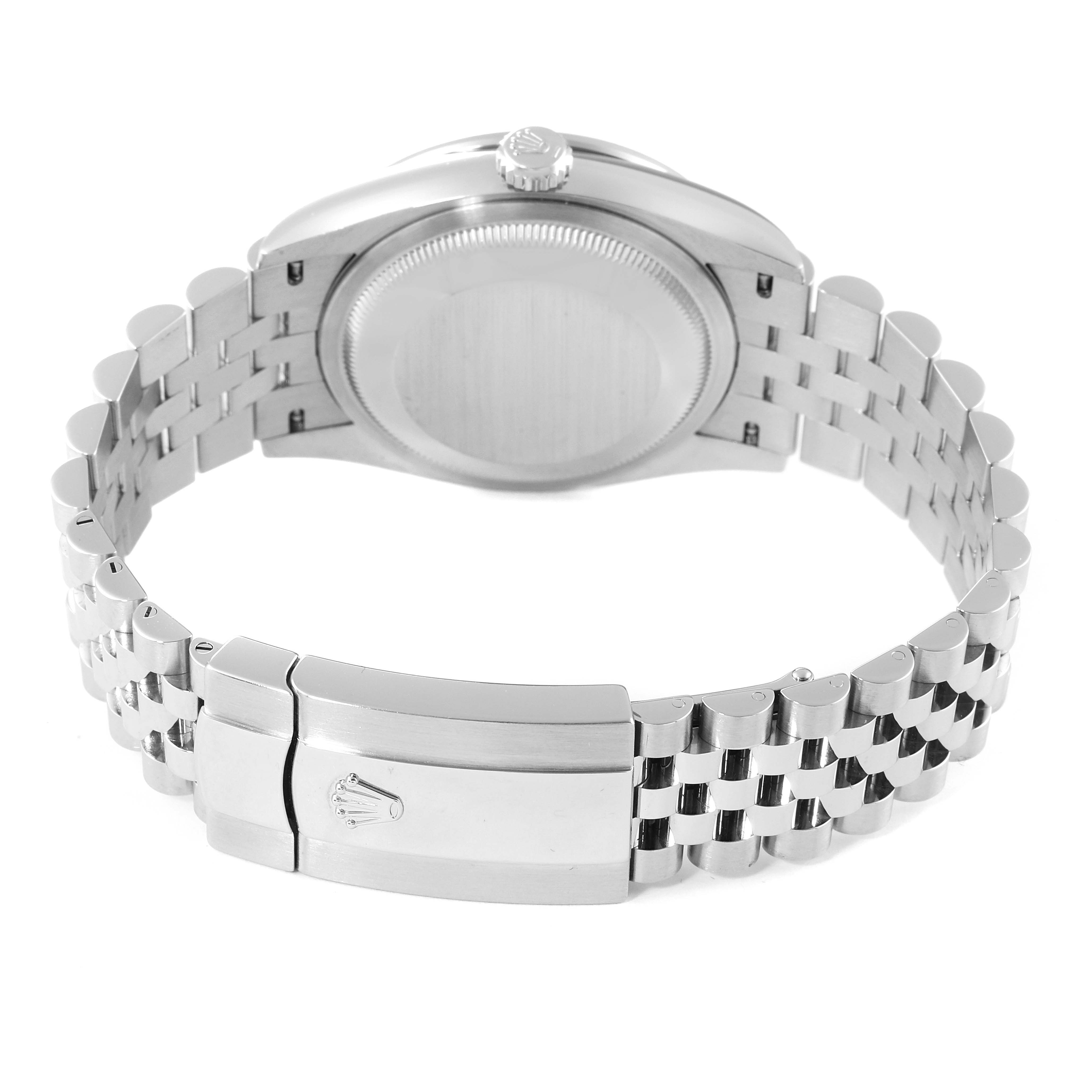 The image shows the back view of a Rolex Datejust 126284 Men's Stainless Steel Silver Dial 126284 Men's Stainless Steel Silver Dial watch, focusing on its case back, crown, and bracelet clasp.