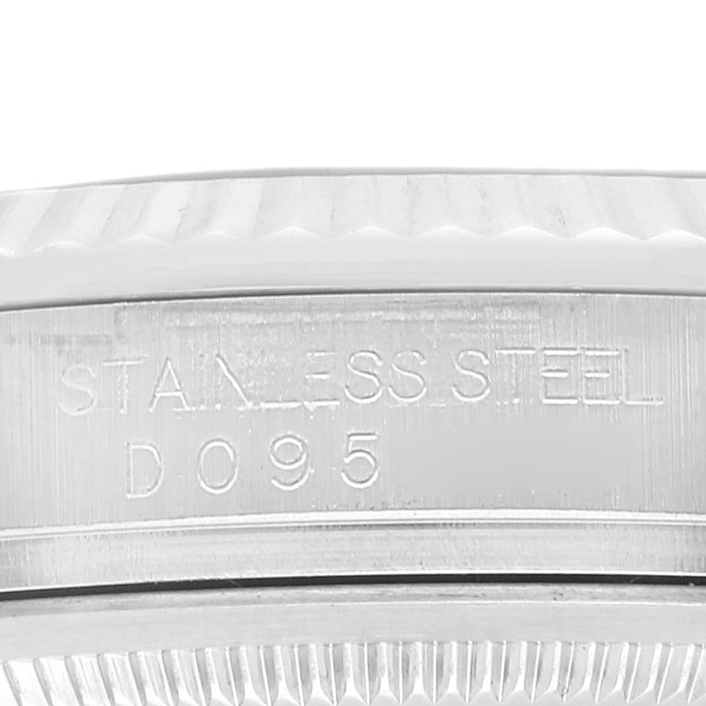 This image shows a close-up of the side engraving on a Rolex Datejust 116234 Men's Stainless Steel Blue Dial 116234 Men's Stainless Steel Blue Dial watch, highlighting "STAINLESS STEEL D095."
