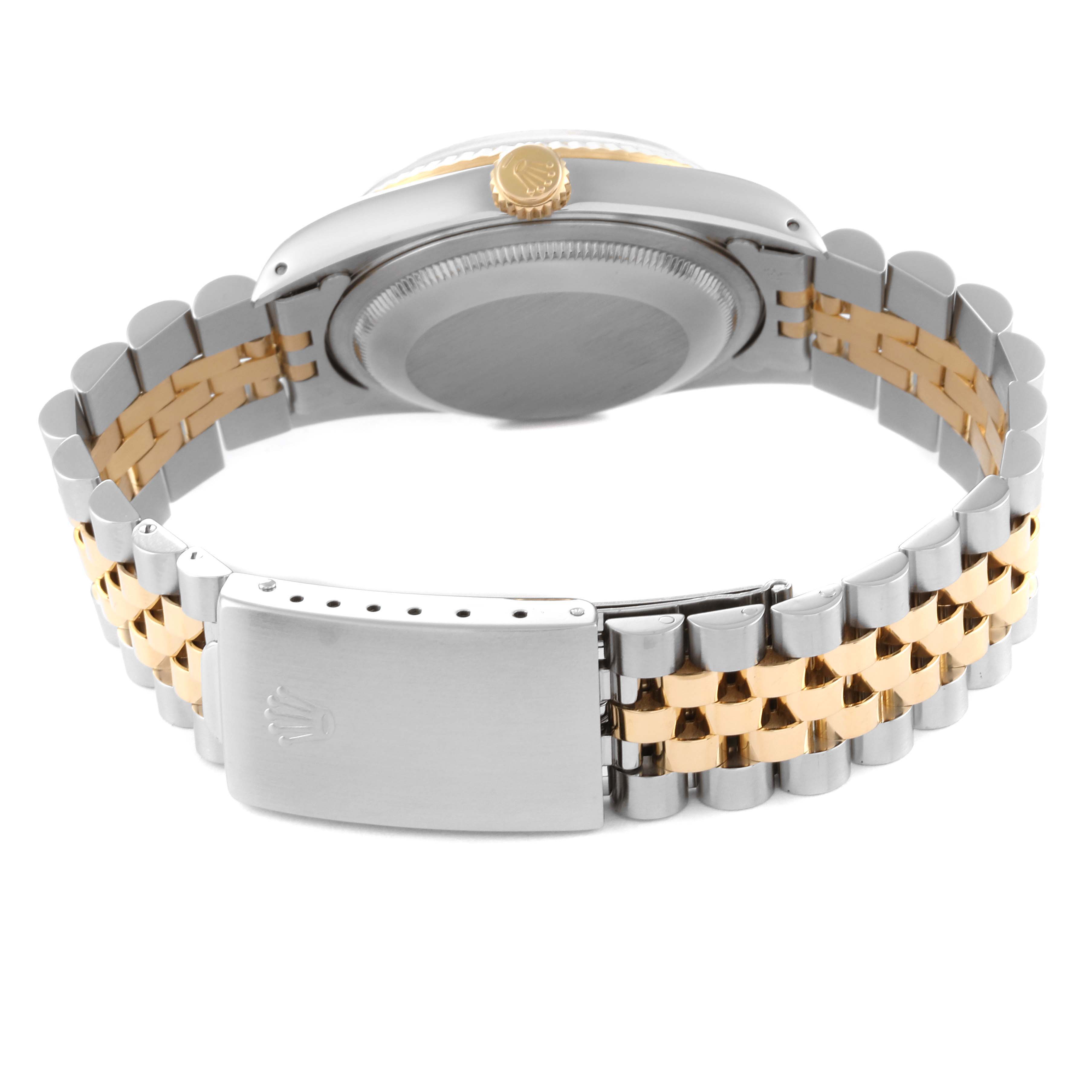 This image shows the back of a Rolex Datejust 16233 Men's Steel and Gold (two tone) Black Dial 16233 Men's Steel and Gold (two tone) Black Dial watch, highlighting its case, crown, and two-tone jubilee bracelet with clasp.