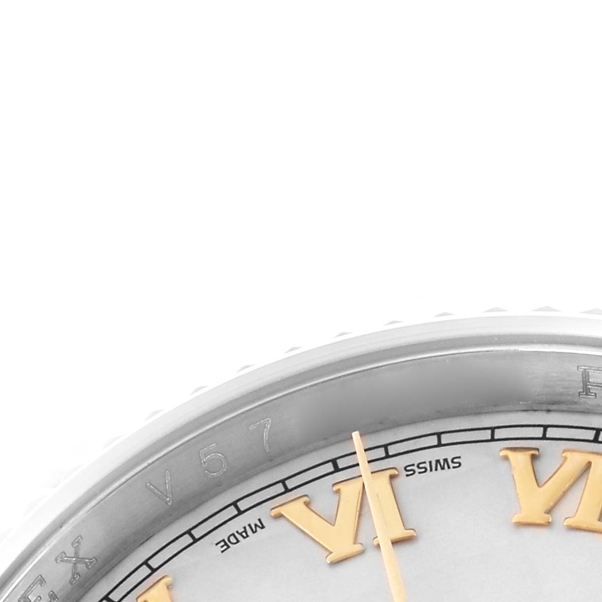 The image shows a close-up of the Rolex Datejust model 116233 watch face, focusing on the Roman numerals and part of the bezel.