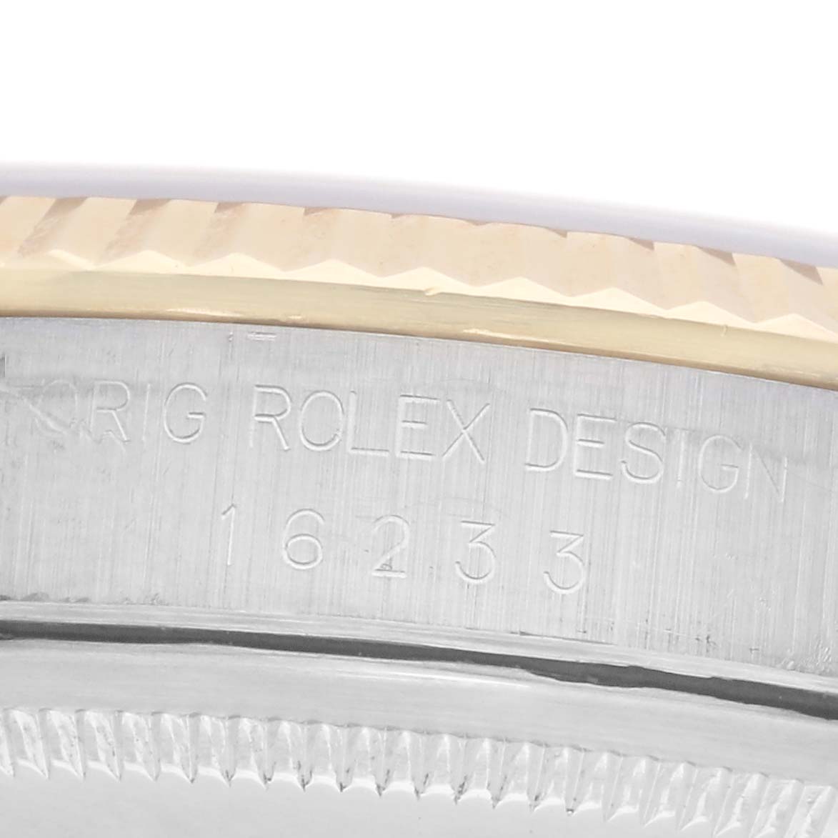 The image shows a close-up of the side of the Rolex Datejust model 16233, highlighting the engraved model number and portions of the bezel and case.