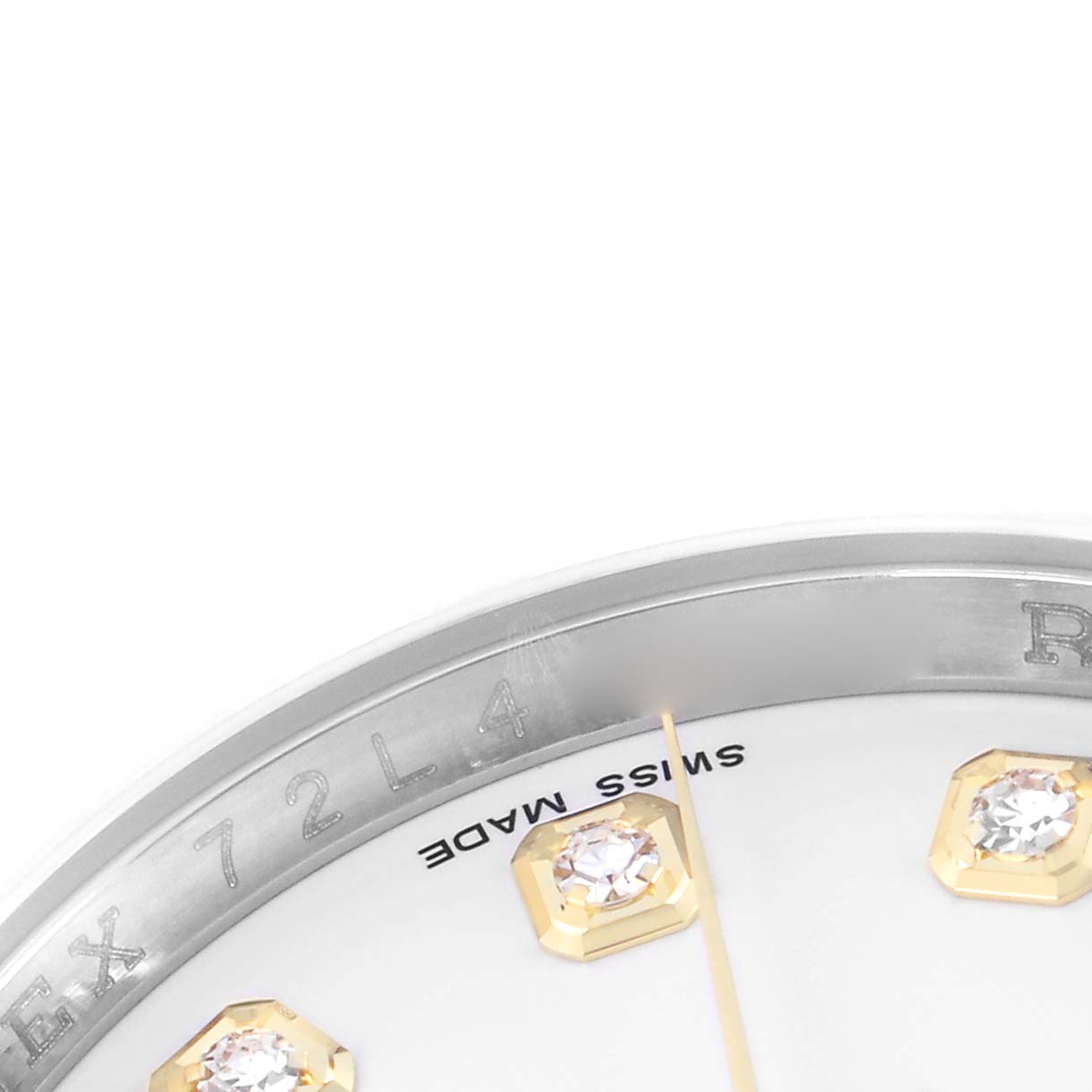 The image shows a close-up of the Rolex Datejust model 116233, highlighting part of the dial, "Swiss Made" text, diamond hour markers, and the rehaut engraving.