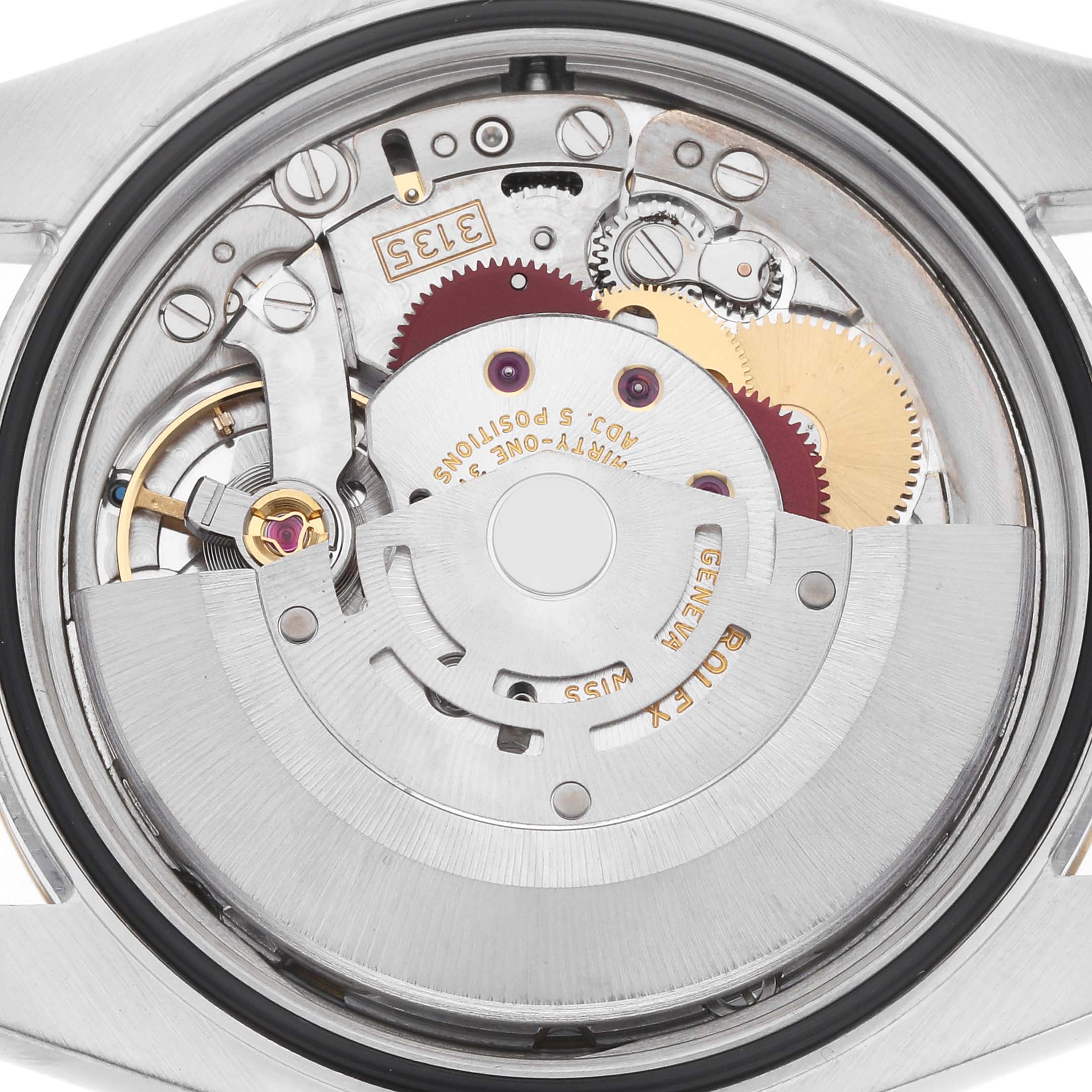 The image shows the movement of a Rolex Datejust model 116233 men
s watch, viewed from the back, highlighting gears and intricate components.
