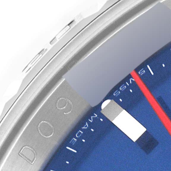 The image shows a close-up of the bezel and part of the blue dial with markers on a Rolex Turn-o-Graph 116264 Men's Stainless Steel Blue Dial 116264 Men's Stainless Steel Blue Dial watch.