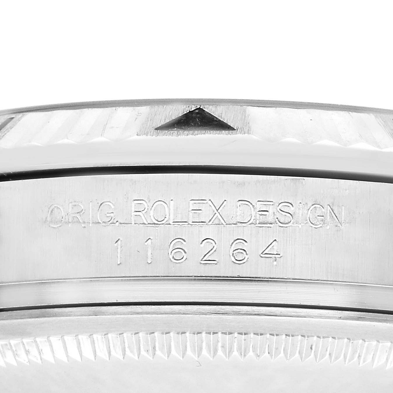 The image shows a close-up of the engraving on the case side of the Rolex Turn-o-Graph model 116264, displaying the design origin and model number.