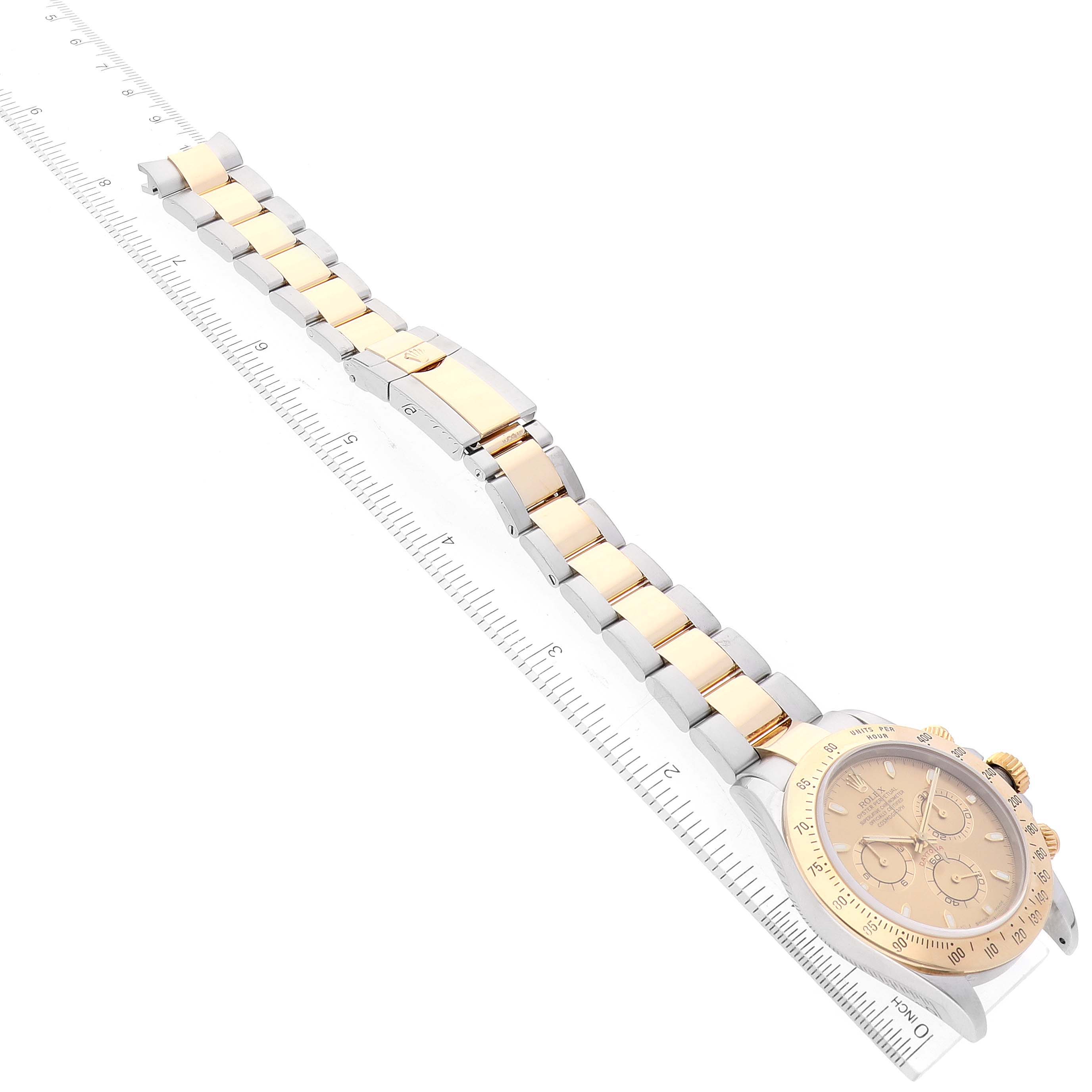 The image shows the full length of the Rolex Daytona 116523 Men
s Steel and Gold (two tone) Champagne Dial 116523 Men
s Steel and Gold (two tone) Champagne Dial watch, including the dial, case, bracelet, and clasp, at a top-down angle.