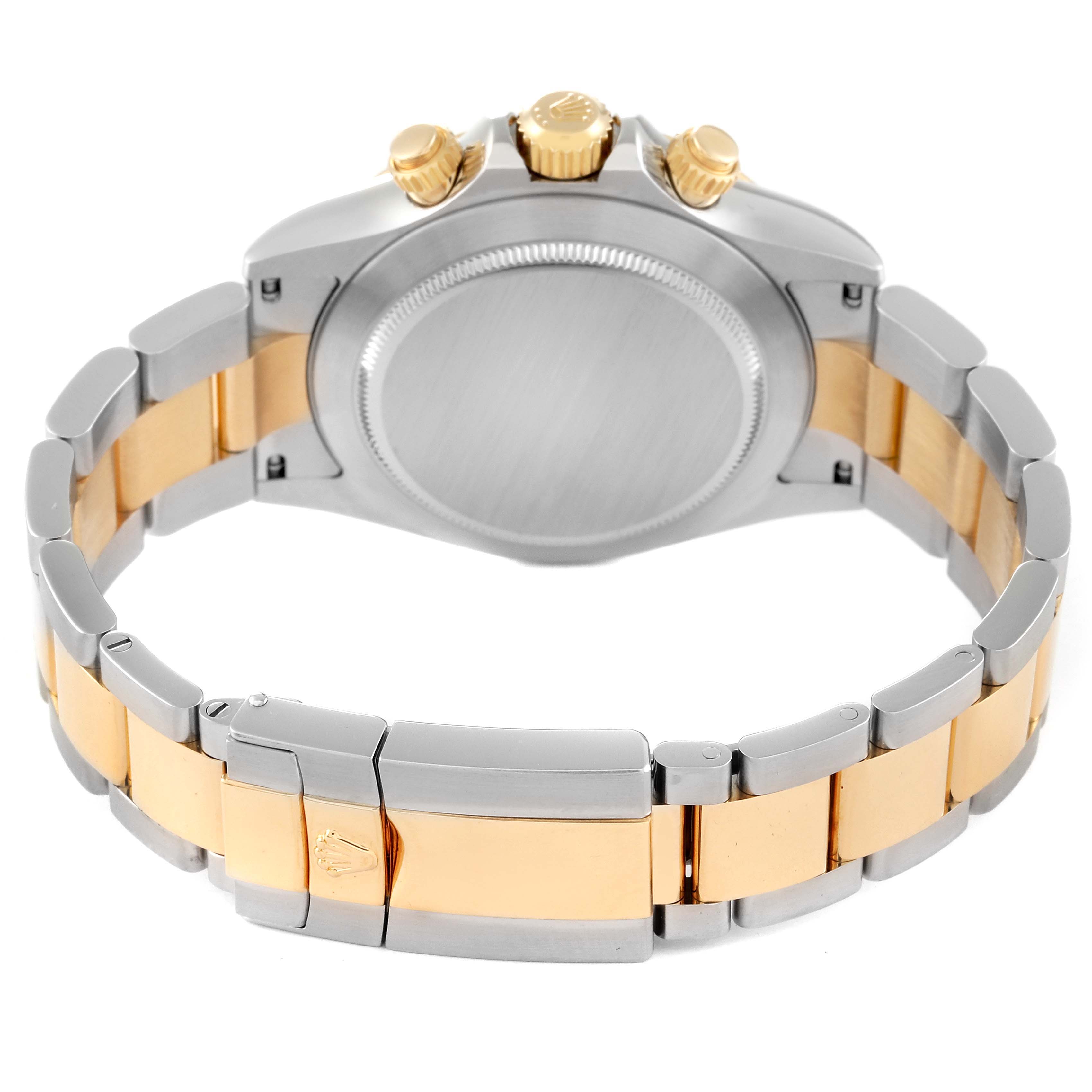 This image shows the back and bracelet of a Rolex Daytona 116523 Men
s Steel and Gold (two tone) Champagne Dial 116523 Men
s Steel and Gold (two tone) Champagne Dial watch with gold and silver accents.