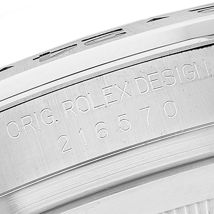 The image shows the side of the case of a Rolex Explorer 216570 Men
s Stainless Steel White Dial 216570 Men
s Stainless Steel White Dial model, displaying the engraved reference number 216570.