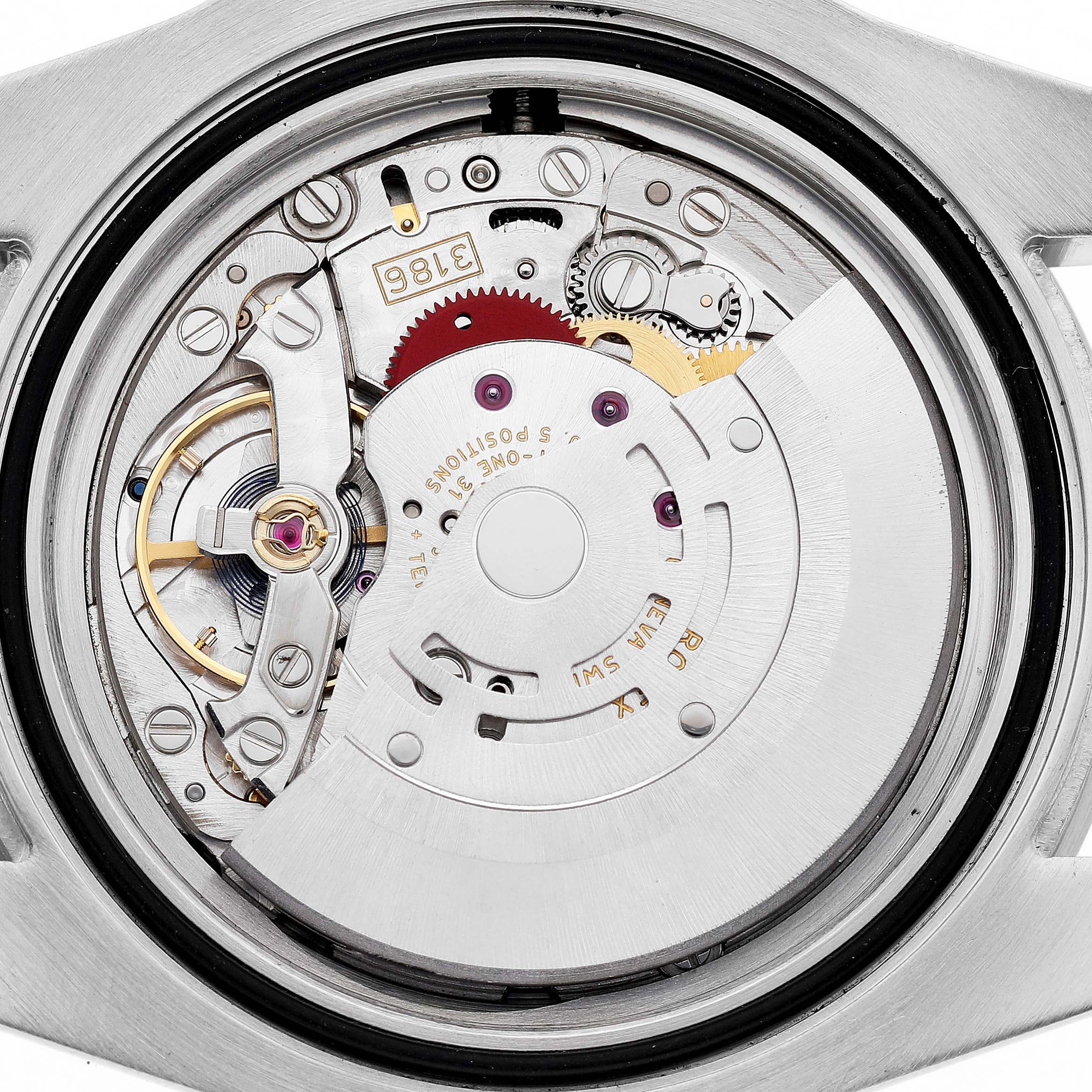 The image shows the movement of a Rolex GMT-Master 116710 Men's Stainless Steel Black Dial watch from the back, highlighting its intricate mechanical components.