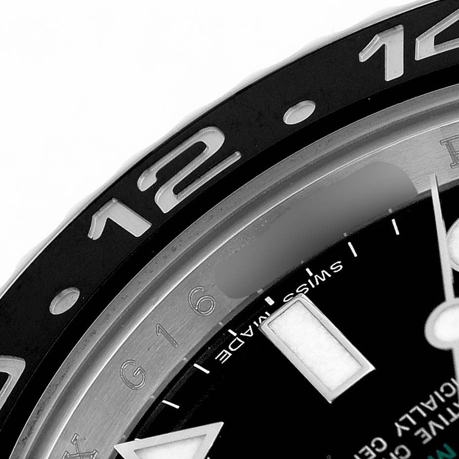 The image shows a close-up of the bezel and part of the dial of a Rolex GMT-Master 116710 Men's Stainless Steel Black Dial, highlighting the hour markings.