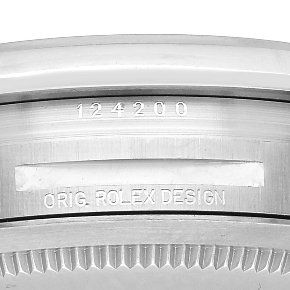 This image shows a close-up of the case back and serial number of a Rolex Oyster Perpetual 124200 Men's Stainless Steel Silver Dial 124200 Men's Stainless Steel Silver Dial watch.