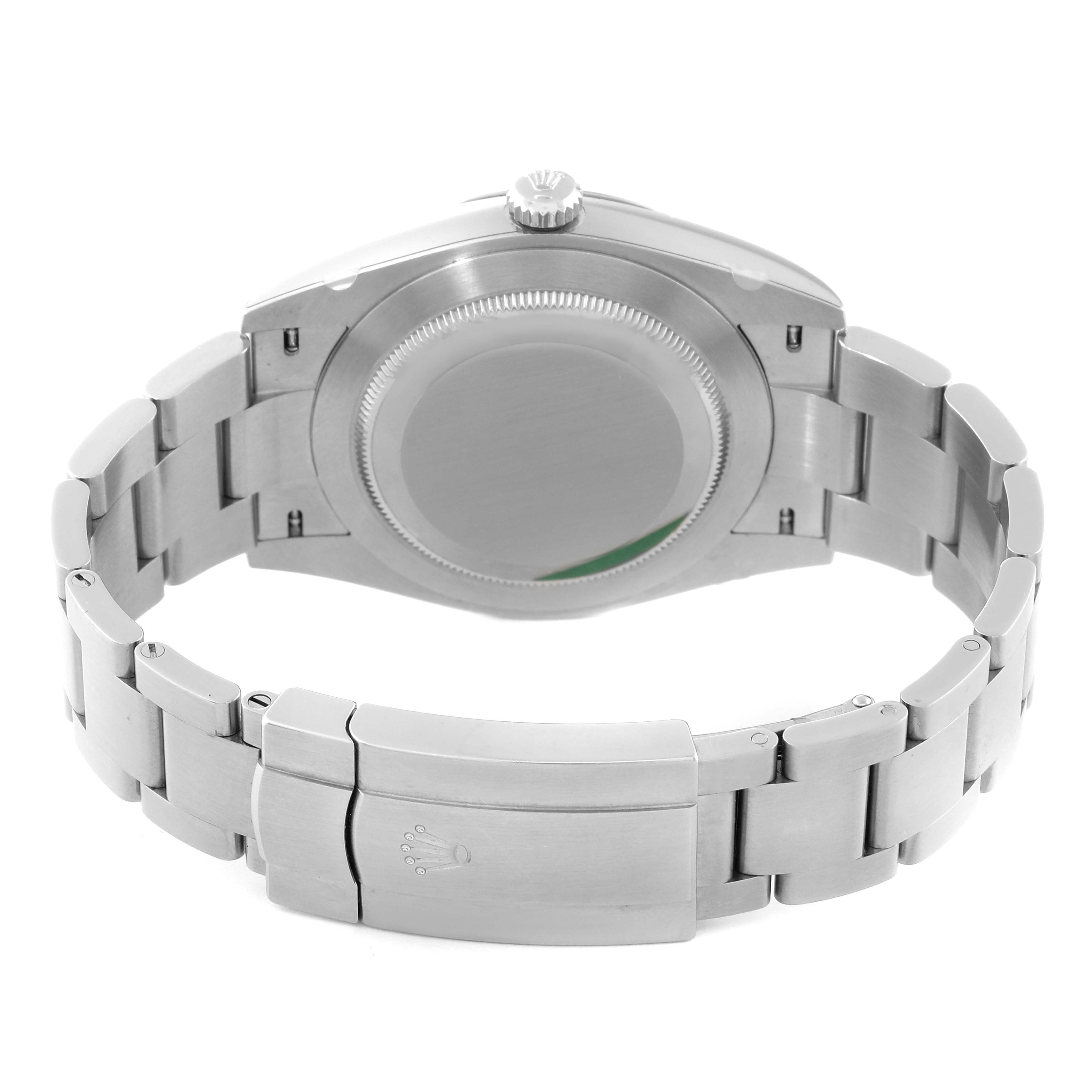 The image shows the back case, screw-down crown, and bracelet of the Rolex Oyster Perpetual 124300 Men's Stainless Steel Green Dial 124300 Men's Stainless Steel Green Dial watch.