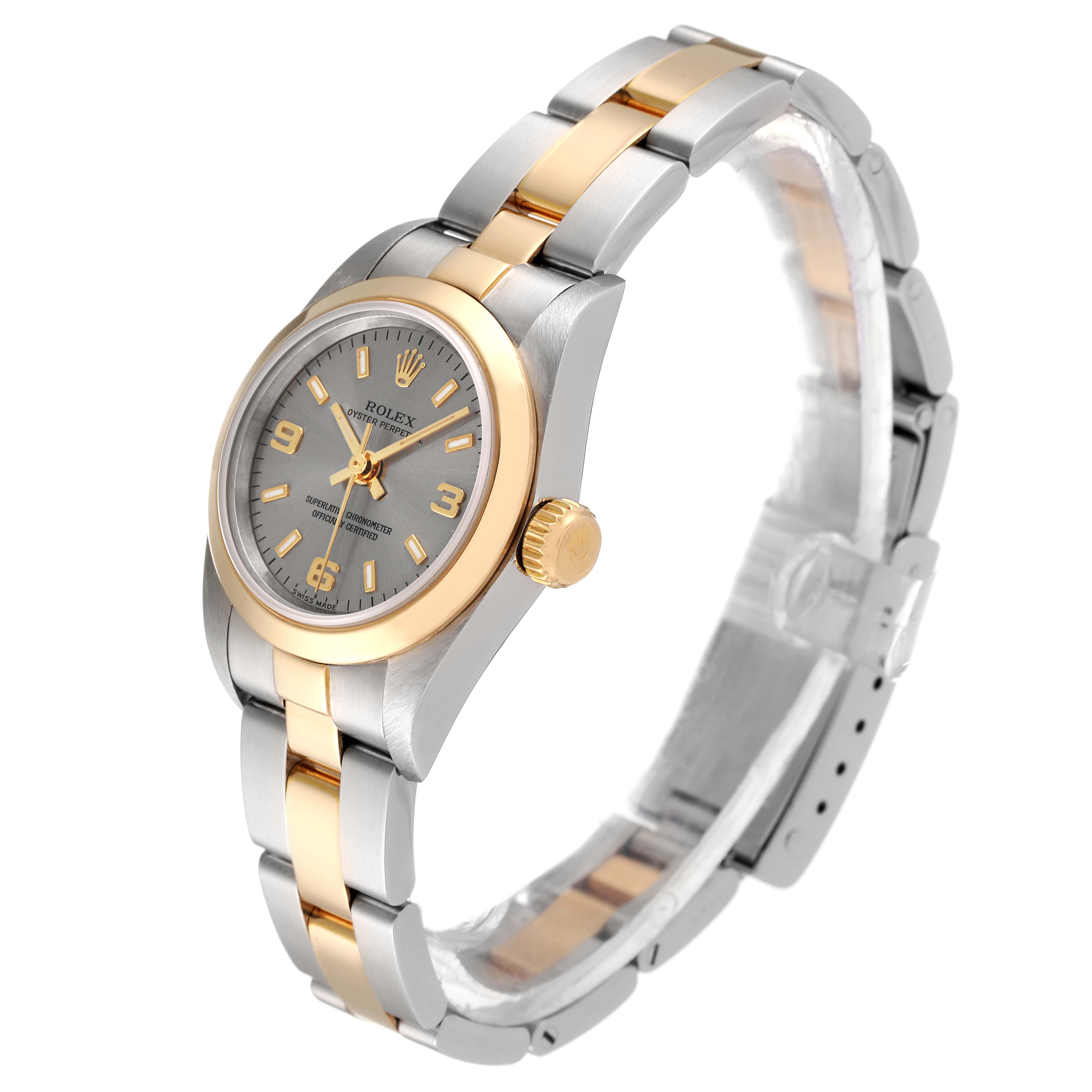 The Rolex Oyster Perpetual 76183 Women's Steel and Gold (two tone) Grey Dial 76183 Women's Steel and Gold (two tone) Grey Dial watch is shown at a three-quarter angle highlighting the face, bezel, and part of the bracelet.