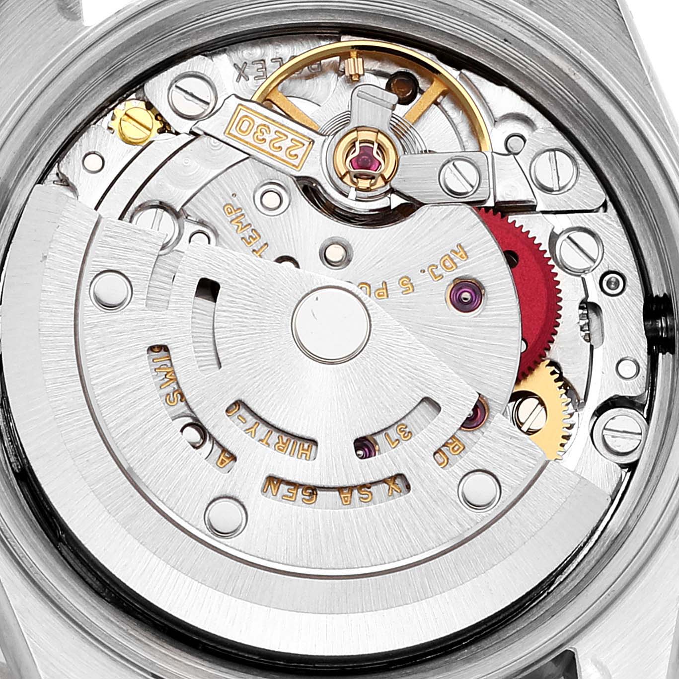 This image shows a close-up of the Oyster Perpetual Rolex watch movement, revealing its intricate internal mechanisms.