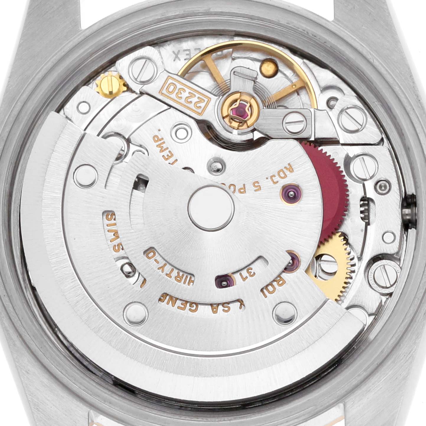 The image shows a close-up of the movement mechanism of the Rolex Oyster Perpetual, model number 76243, displaying gears and components from a top-down angle.