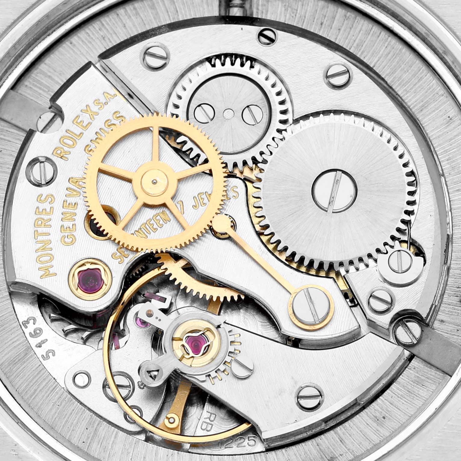 This is a close-up view of the internal mechanism of the Rolex Vintage Collection 6426 Men's Stainless Steel Silver Dial 6426 Men's Stainless Steel Silver Dial watch, showing gears and jewels.