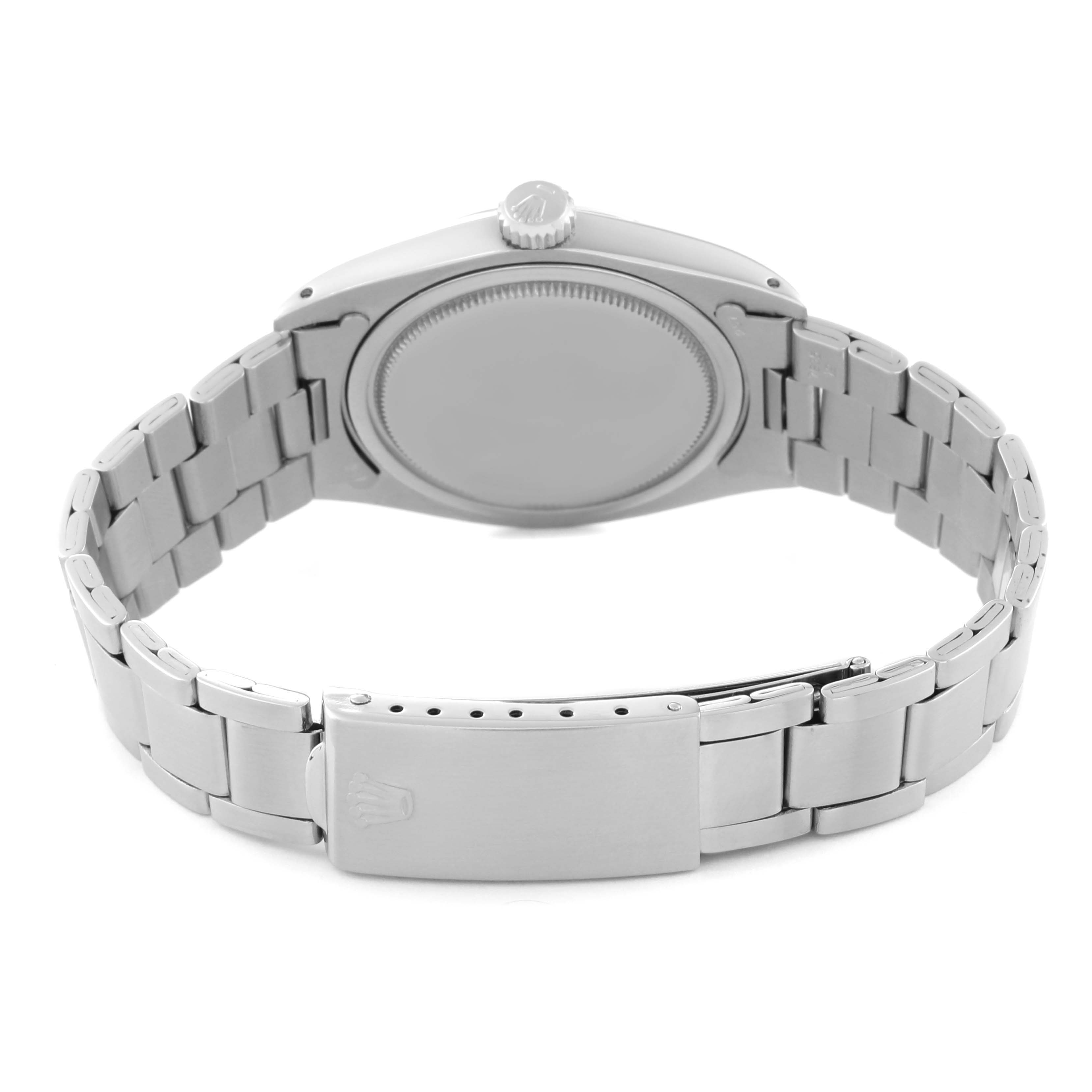 This image shows the back view of a Vintage Collection Rolex watch, highlighting its case back and bracelet with clasp.