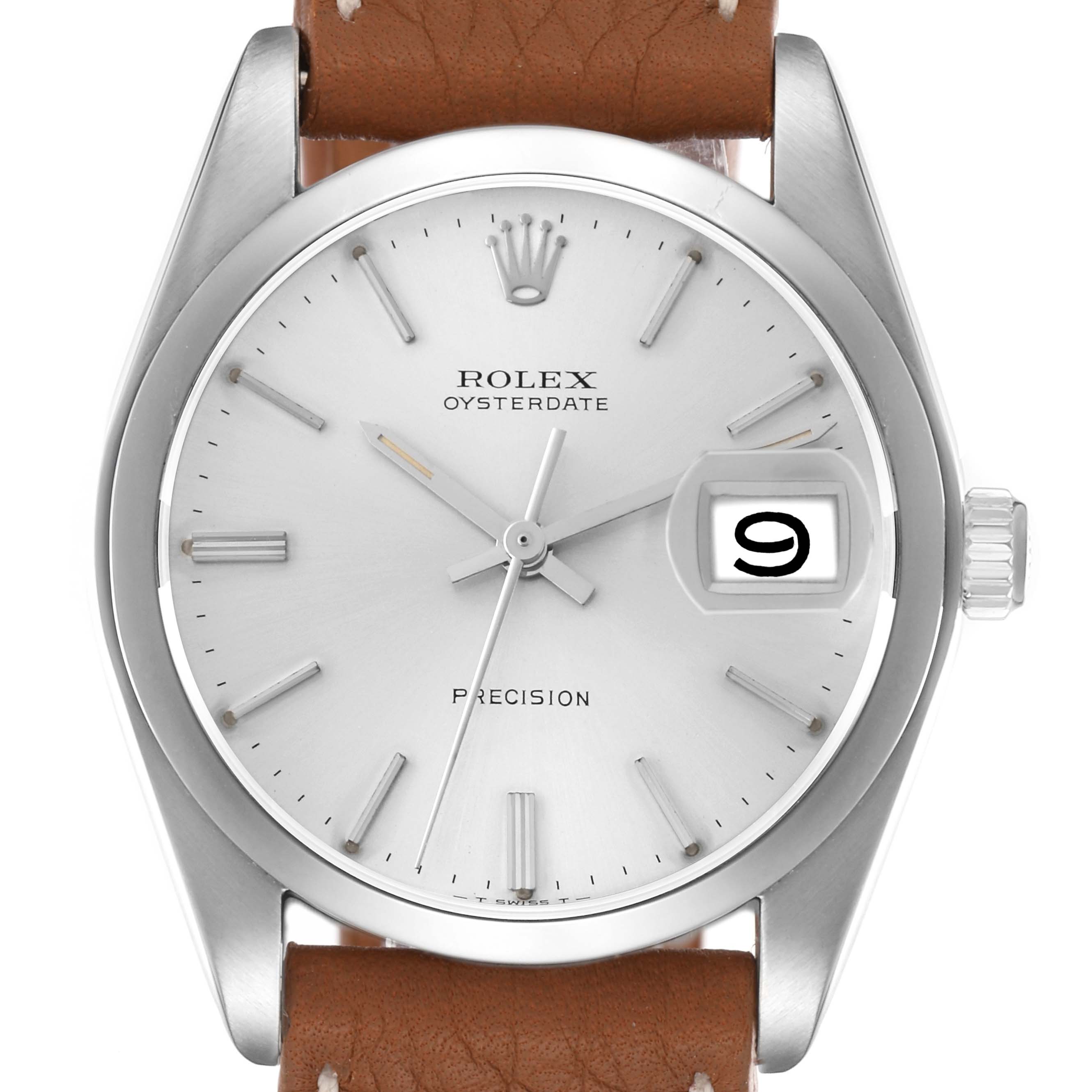 The image shows a front view of the Rolex Oysterdate Precision Vintage Collection, model number 6694, highlighting the dial, crown, and leather strap.