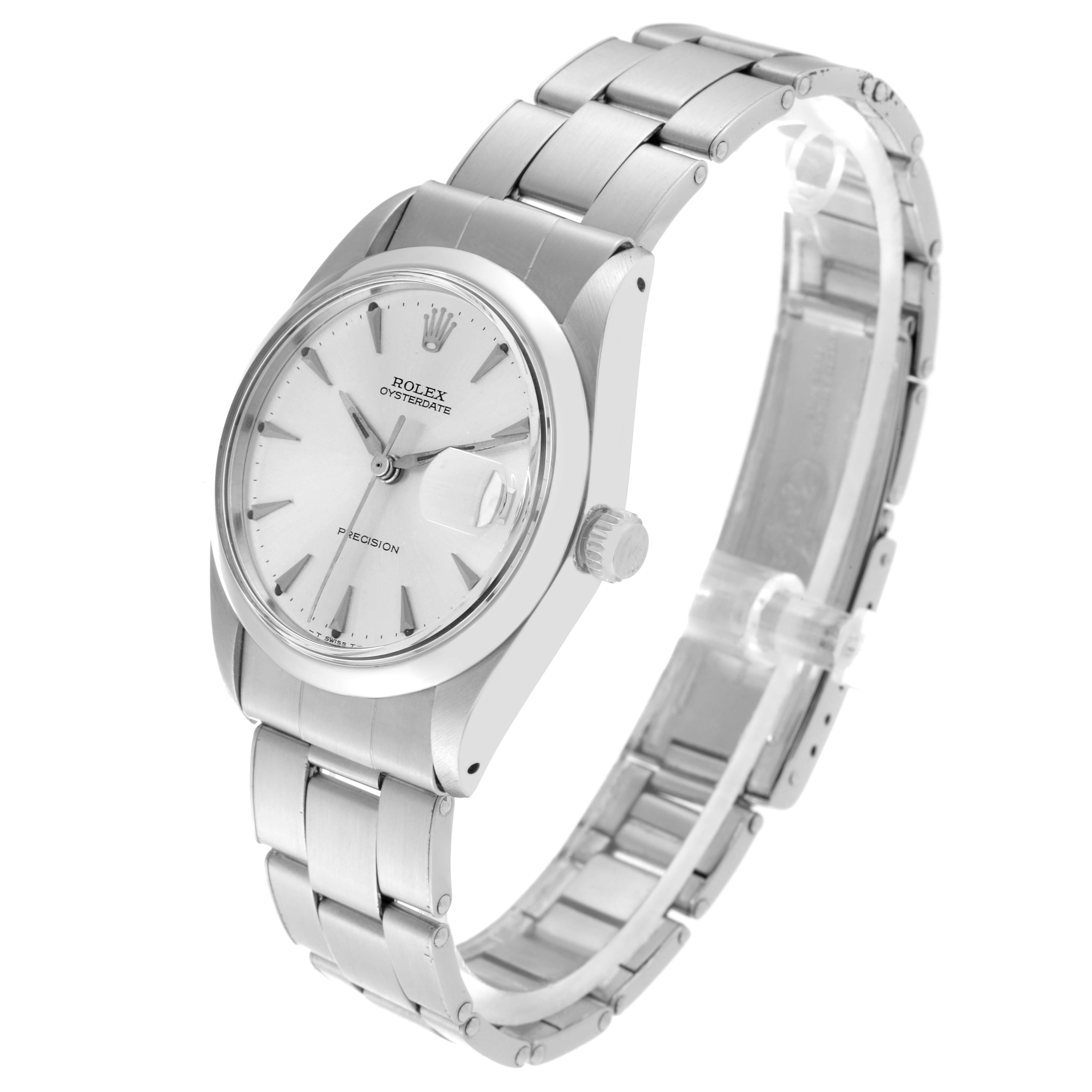 The image shows a Vintage Collection Rolex watch at an angle that highlights its face, bezel, crown, and metal bracelet.