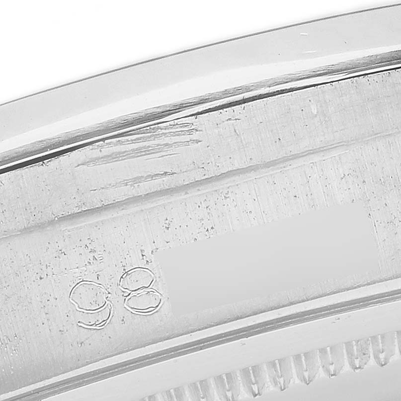 This image shows a close-up of the serial number inscribed on the case of a Rolex Vintage Collection 6694 Men's Stainless Steel Silver Dial 6694 Men's Stainless Steel Silver Dial watch.