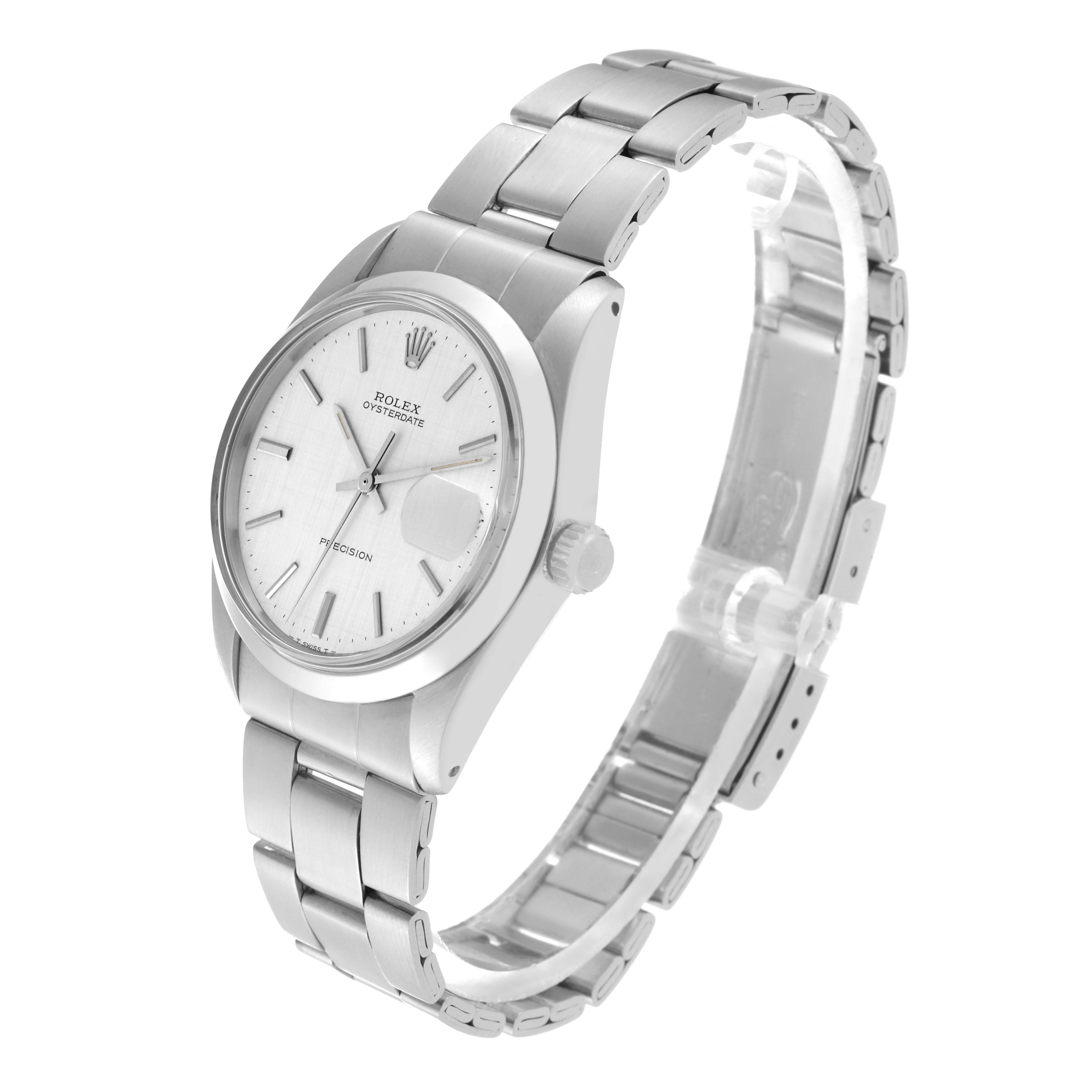 The Vintage Collection Rolex watch is shown at an angled side view, highlighting the face, bezel, crown, and metal bracelet.